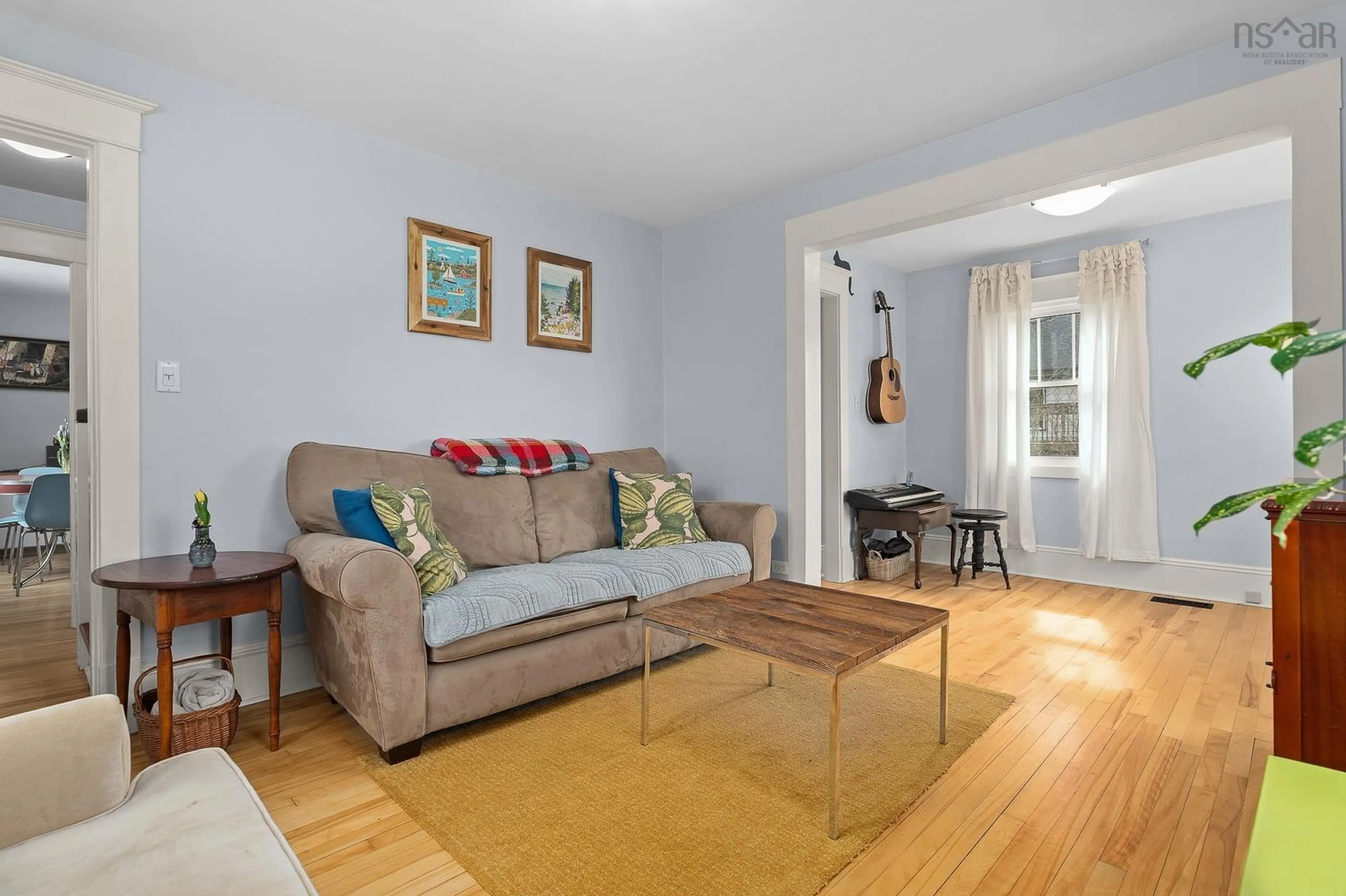 Living room with furniture, wood/laminate floor for 38 Jamieson St, Dartmouth Nova Scotia B3A 3C1