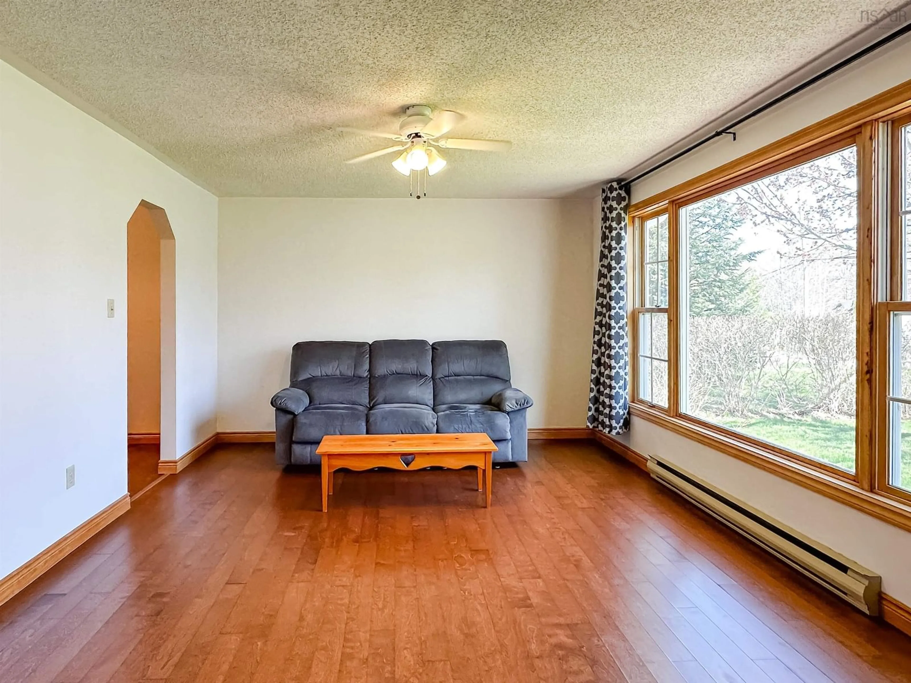 Living room with furniture, wood/laminate floor for 2630 Poplar Dr, Coldbrook Nova Scotia B4R 1B1