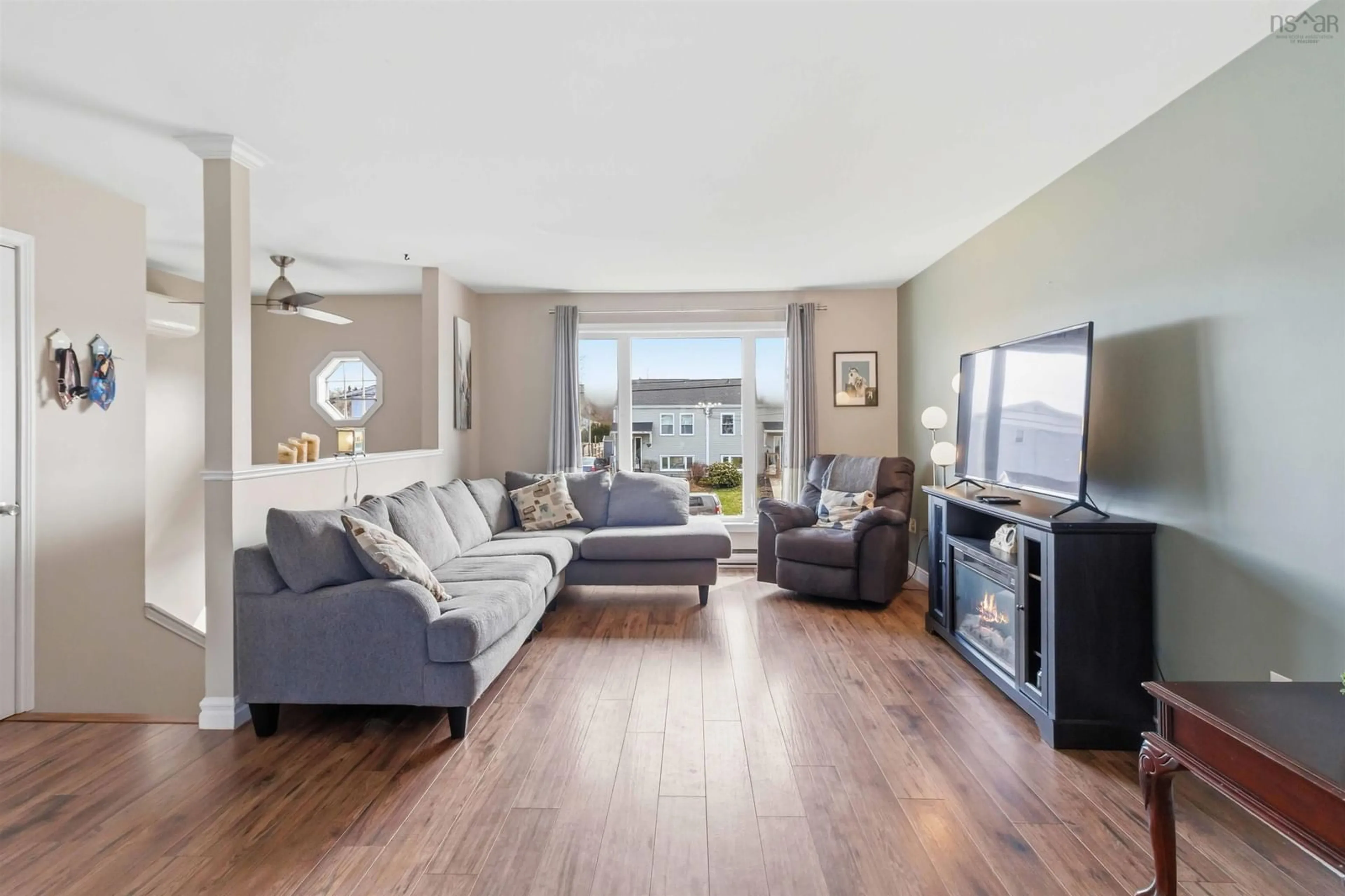 Living room with furniture, wood/laminate floor for 45 Armoyan Dr, Lower Sackville Nova Scotia B4C 3V9