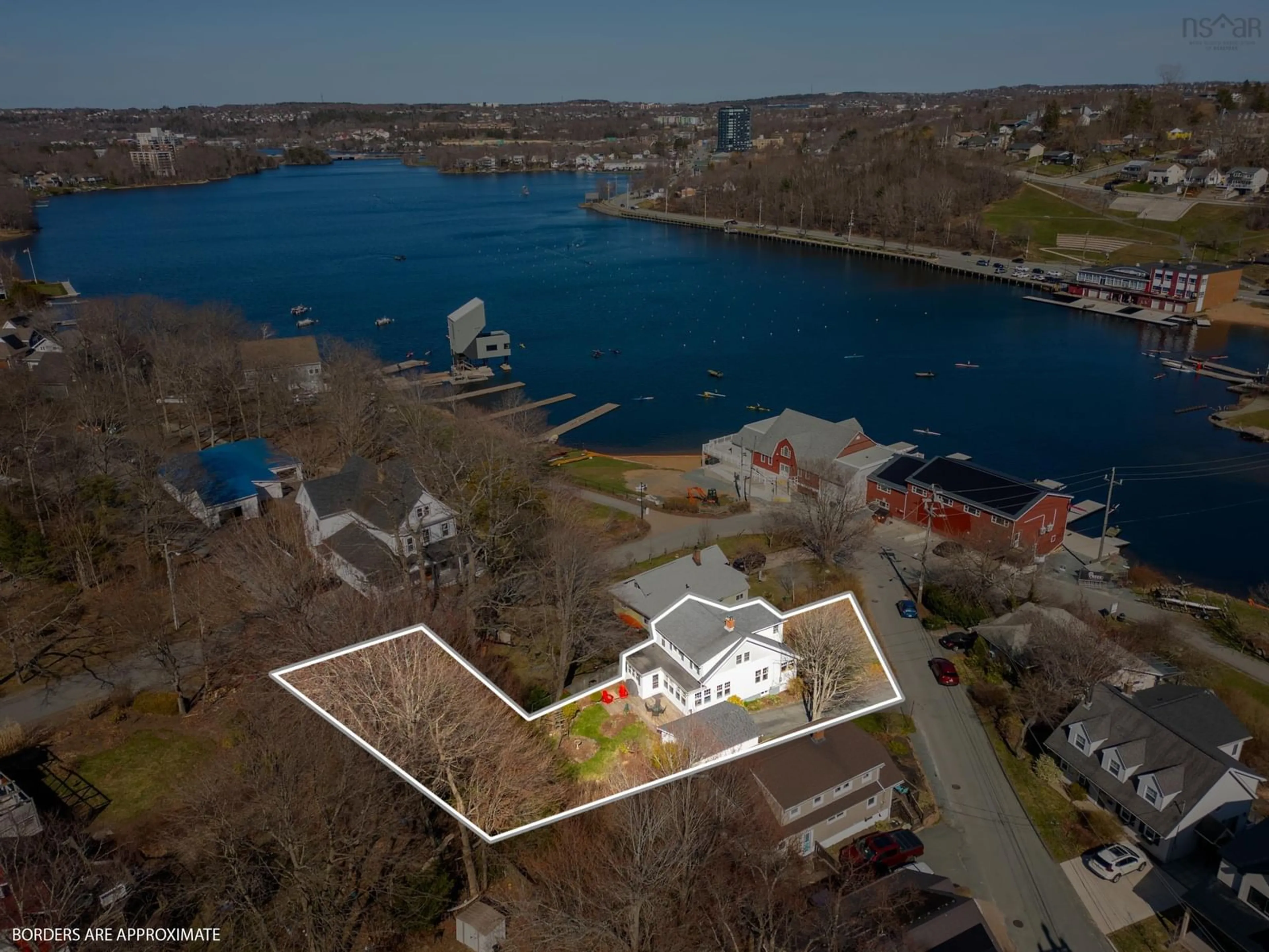 A pic from outside/outdoor area/front of a property/back of a property/a pic from drone, water/lake/river/ocean view for 12 Banook Ave, Dartmouth Nova Scotia B3A 2L4