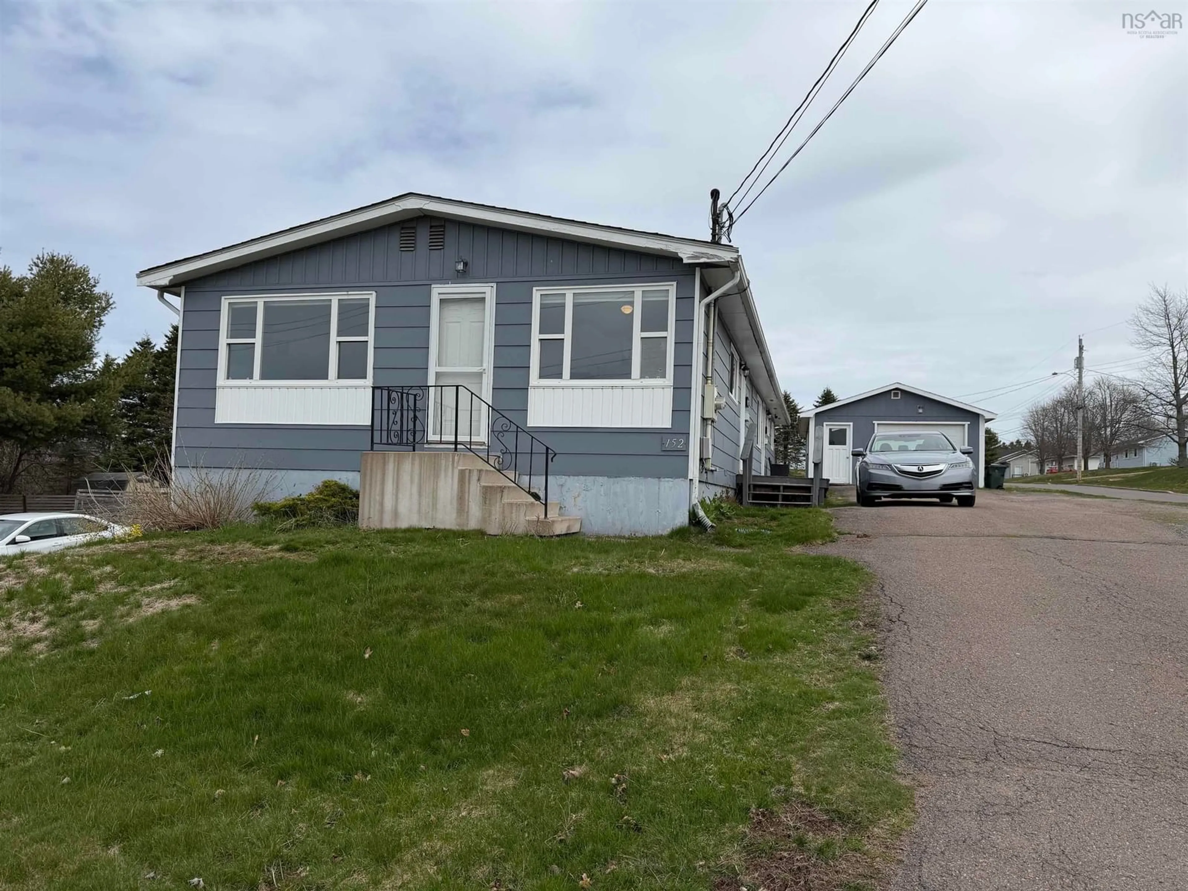 Home with vinyl exterior material, street for 152 Willow St, Amherst Nova Scotia B4H 3W5