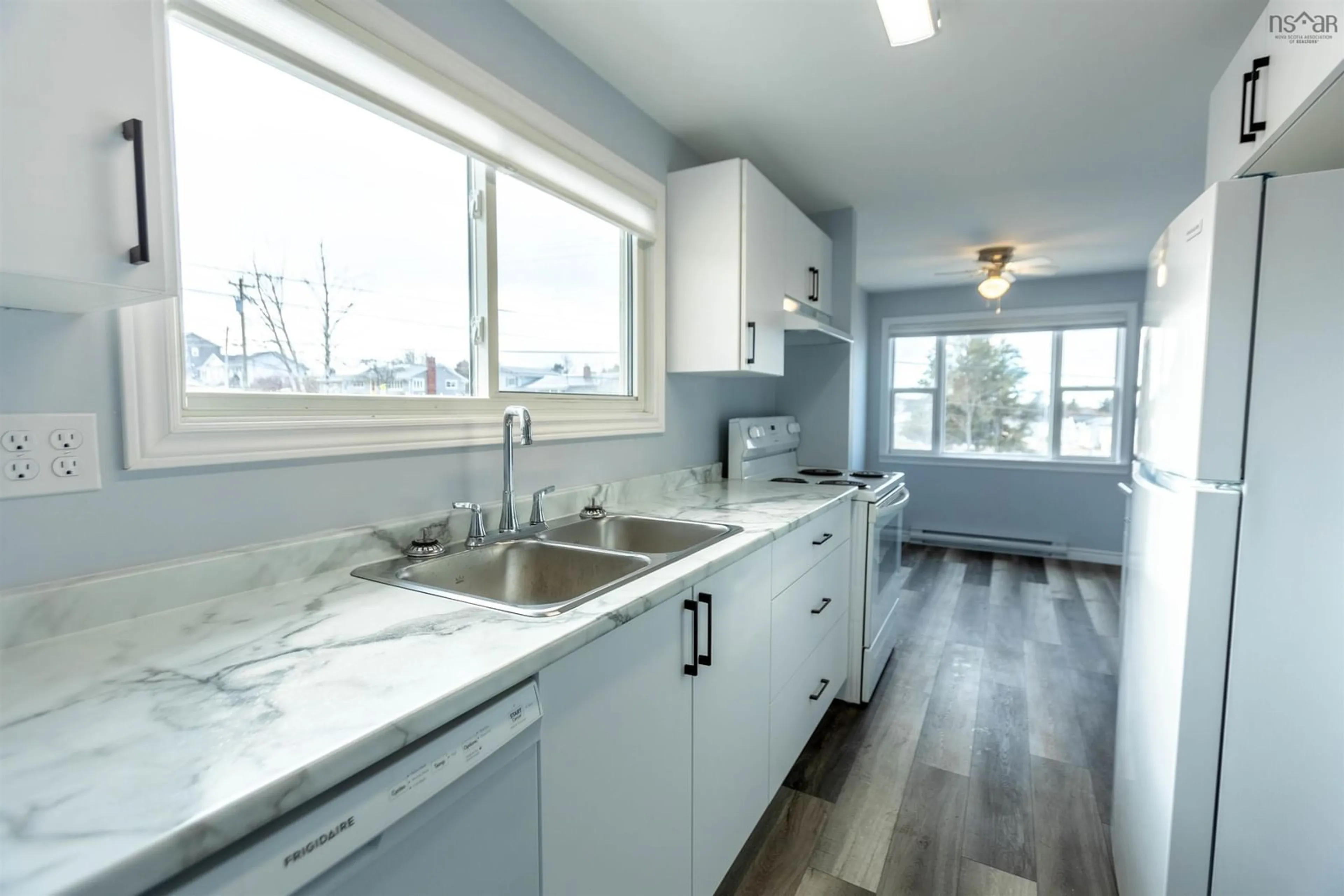 Open concept kitchen, ceramic/tile floor for 152 Willow St, Amherst Nova Scotia B4H 3W5