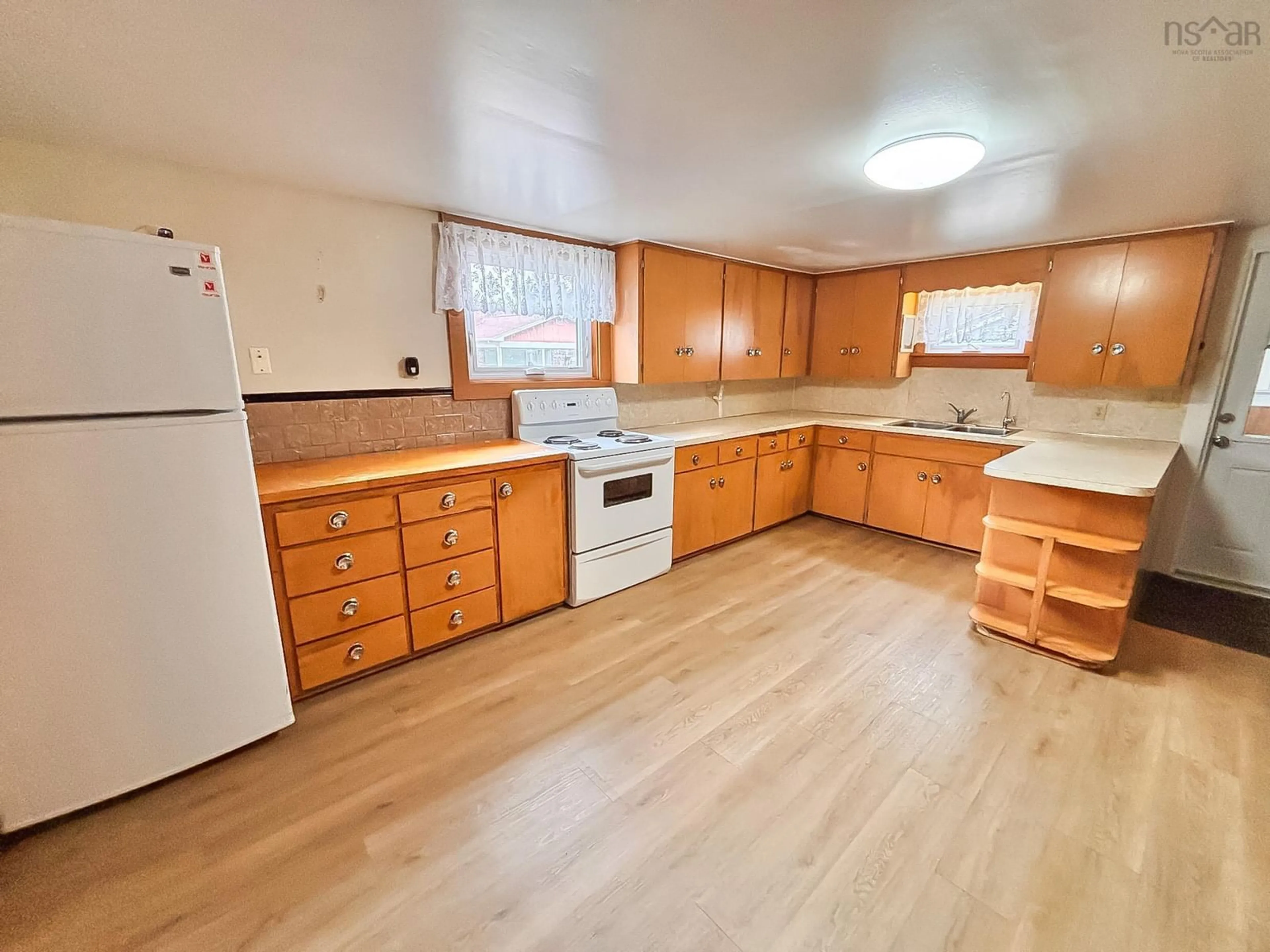 Standard kitchen, wood/laminate floor for 591 Highway 325, Blockhouse Nova Scotia B0J 1E0
