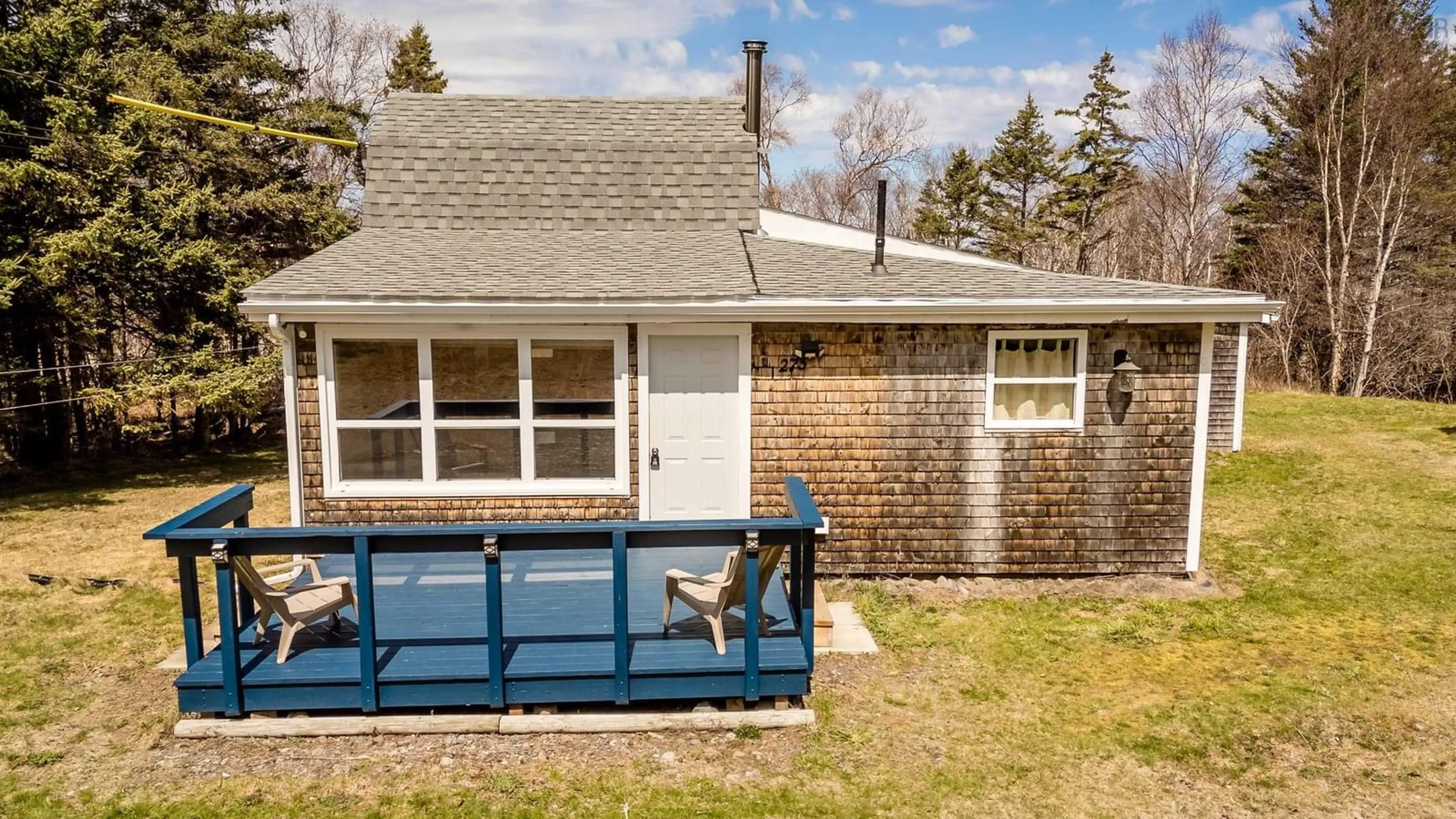 Home with vinyl exterior material, street for 273 Old Baxter Mill Rd, Baxters Harbour Nova Scotia B0P 1H0