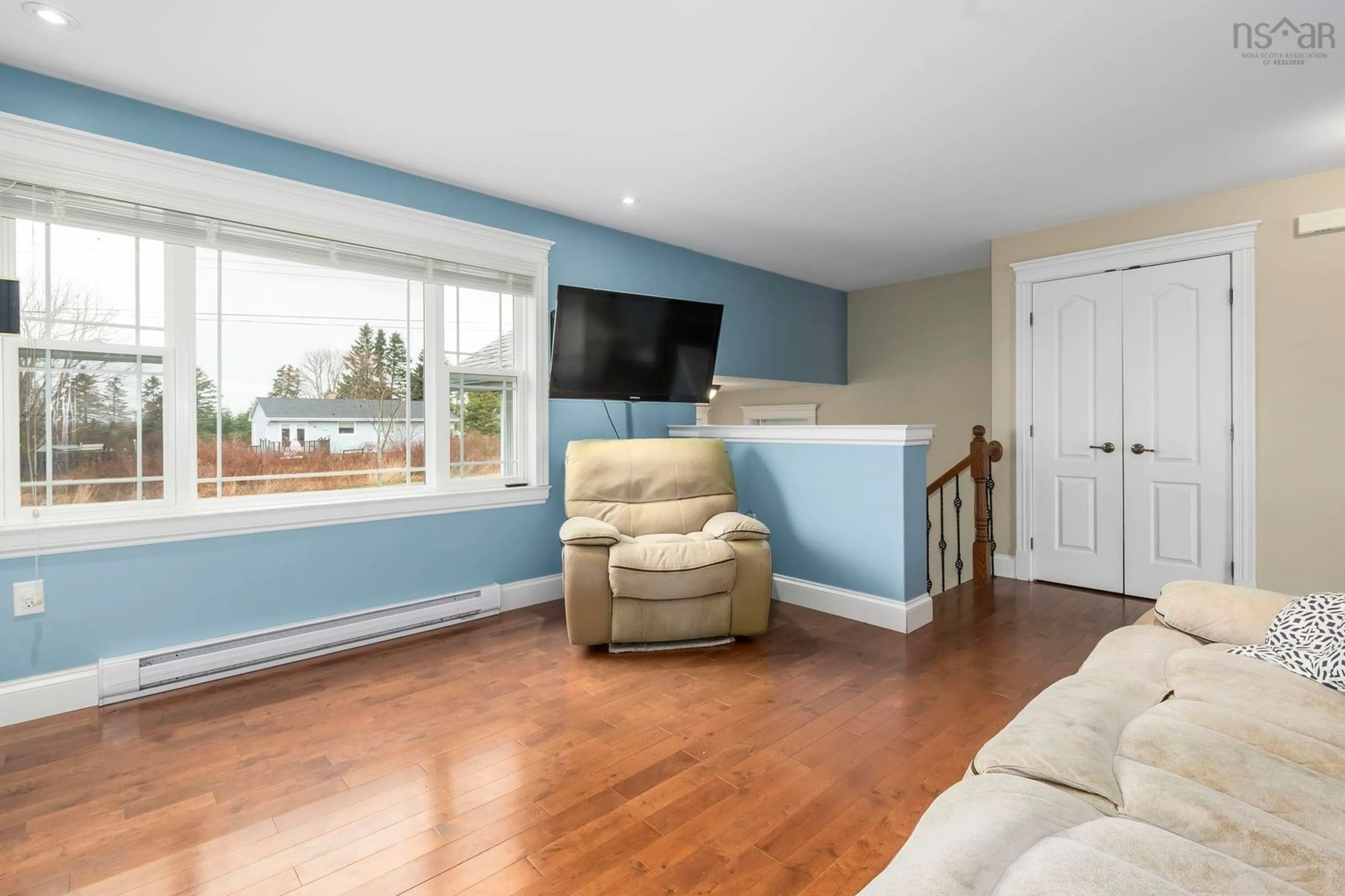 Living room with furniture, wood/laminate floor for 122 Ridding Rd, Eastern Passage Nova Scotia B3G 0E2