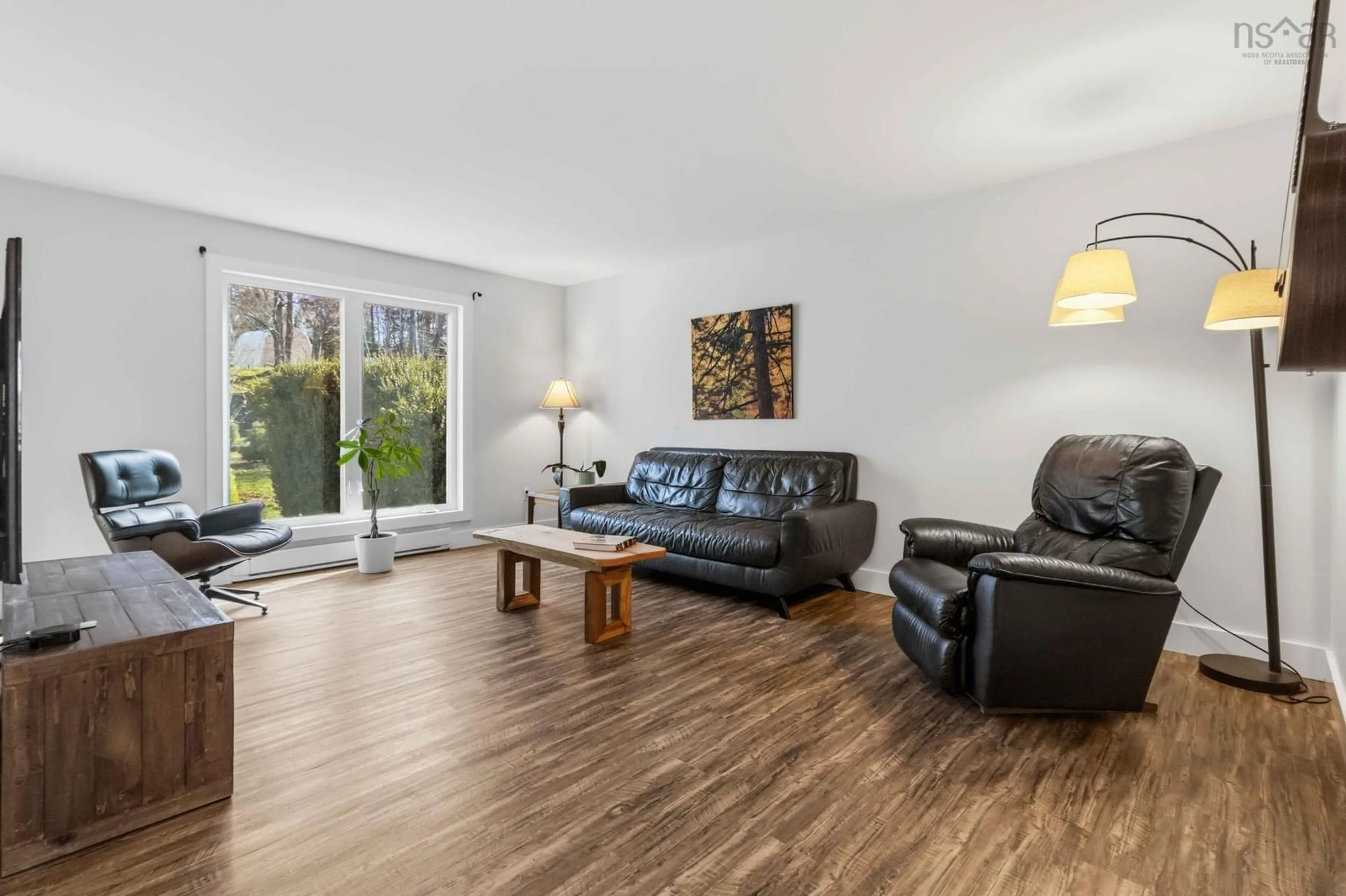 Living room with furniture, wood/laminate floor for 7A Short St, Dartmouth Nova Scotia B2X 2P1