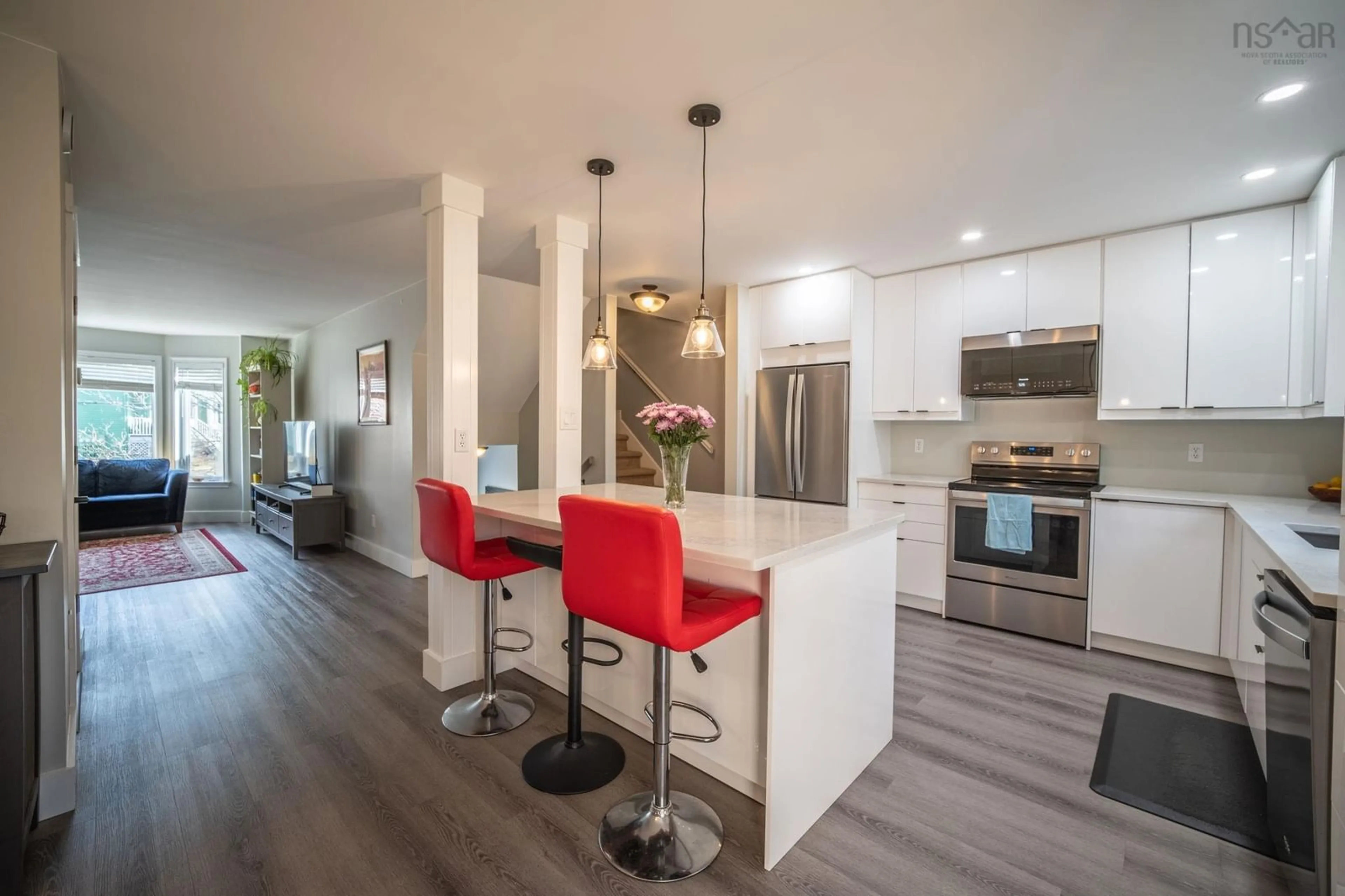 Open concept kitchen, wood/laminate floor for 21 Remington Crt, Halifax Nova Scotia B3M 3Y6