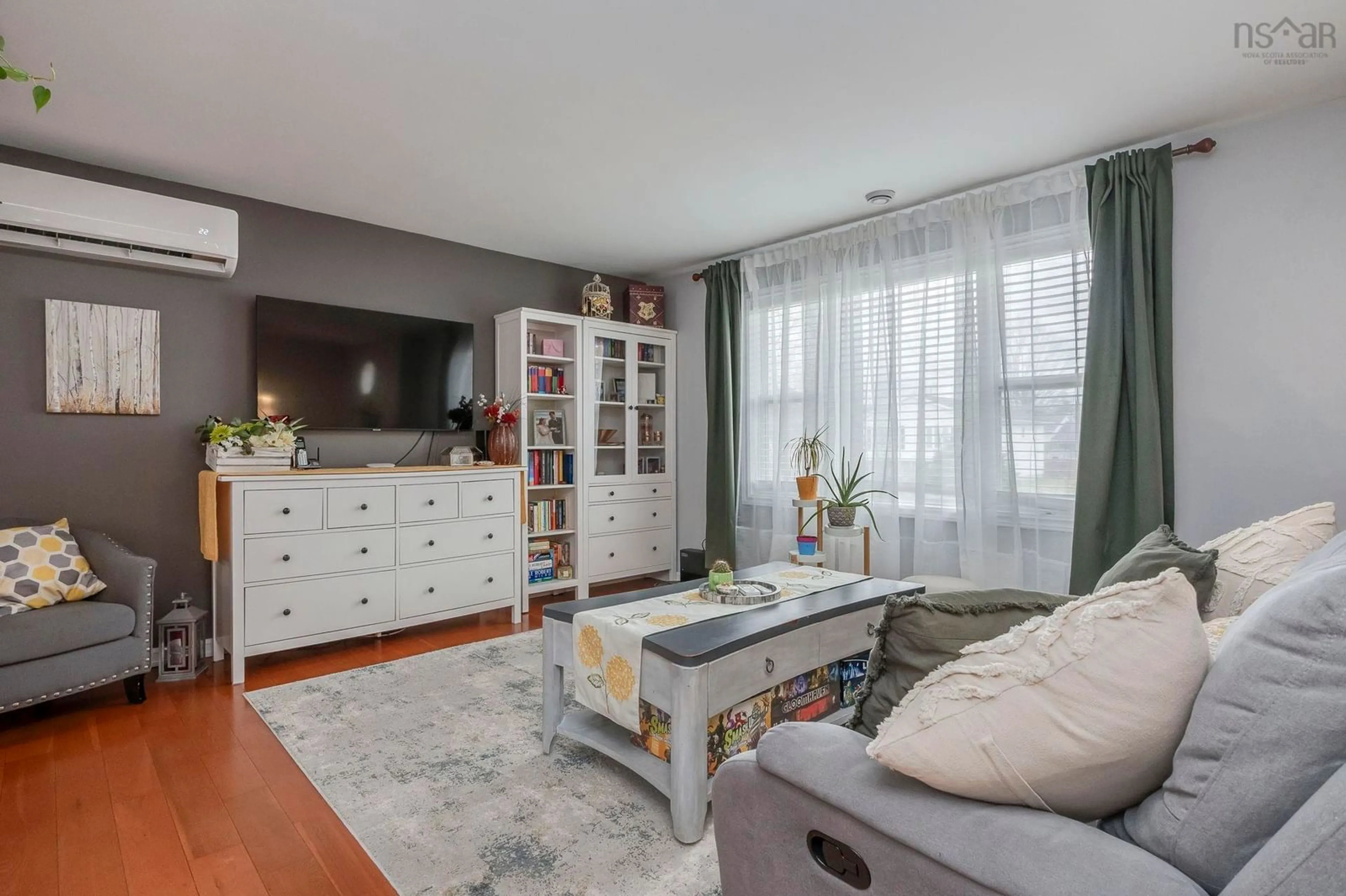 Living room with furniture, wood/laminate floor for 612 Crystal Dr, Greenwood Nova Scotia B0P 1R0