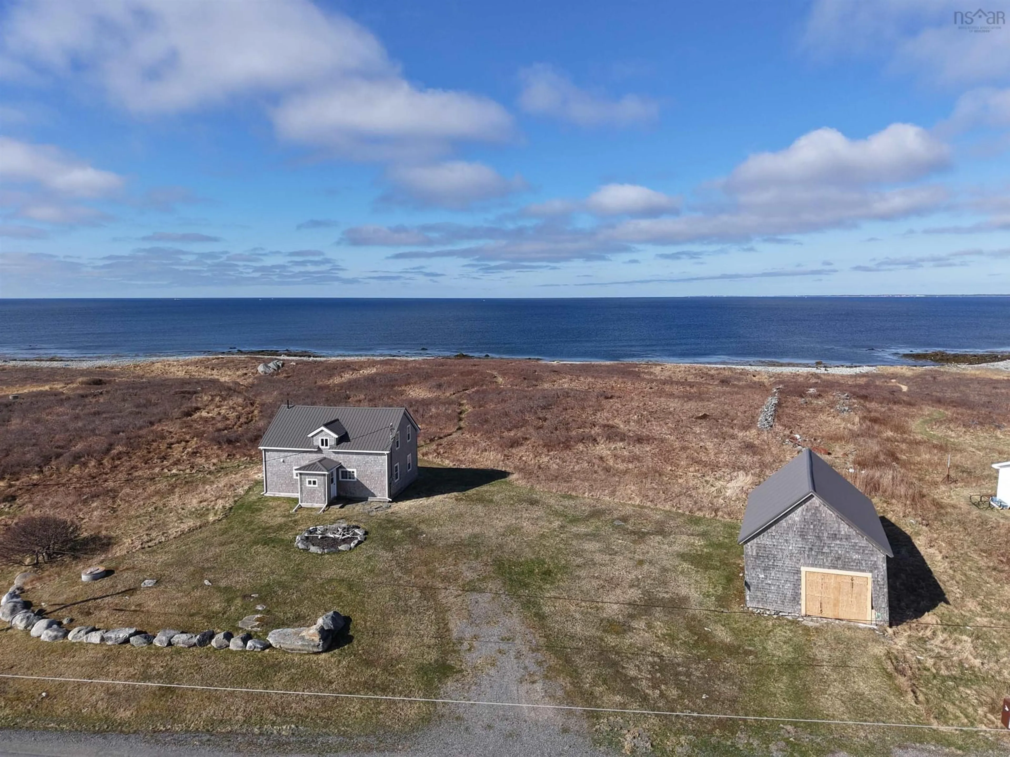 A pic from outside/outdoor area/front of a property/back of a property/a pic from drone, water/lake/river/ocean view for 514 Baccaro Rd, West Baccaro Nova Scotia B0W 1E0