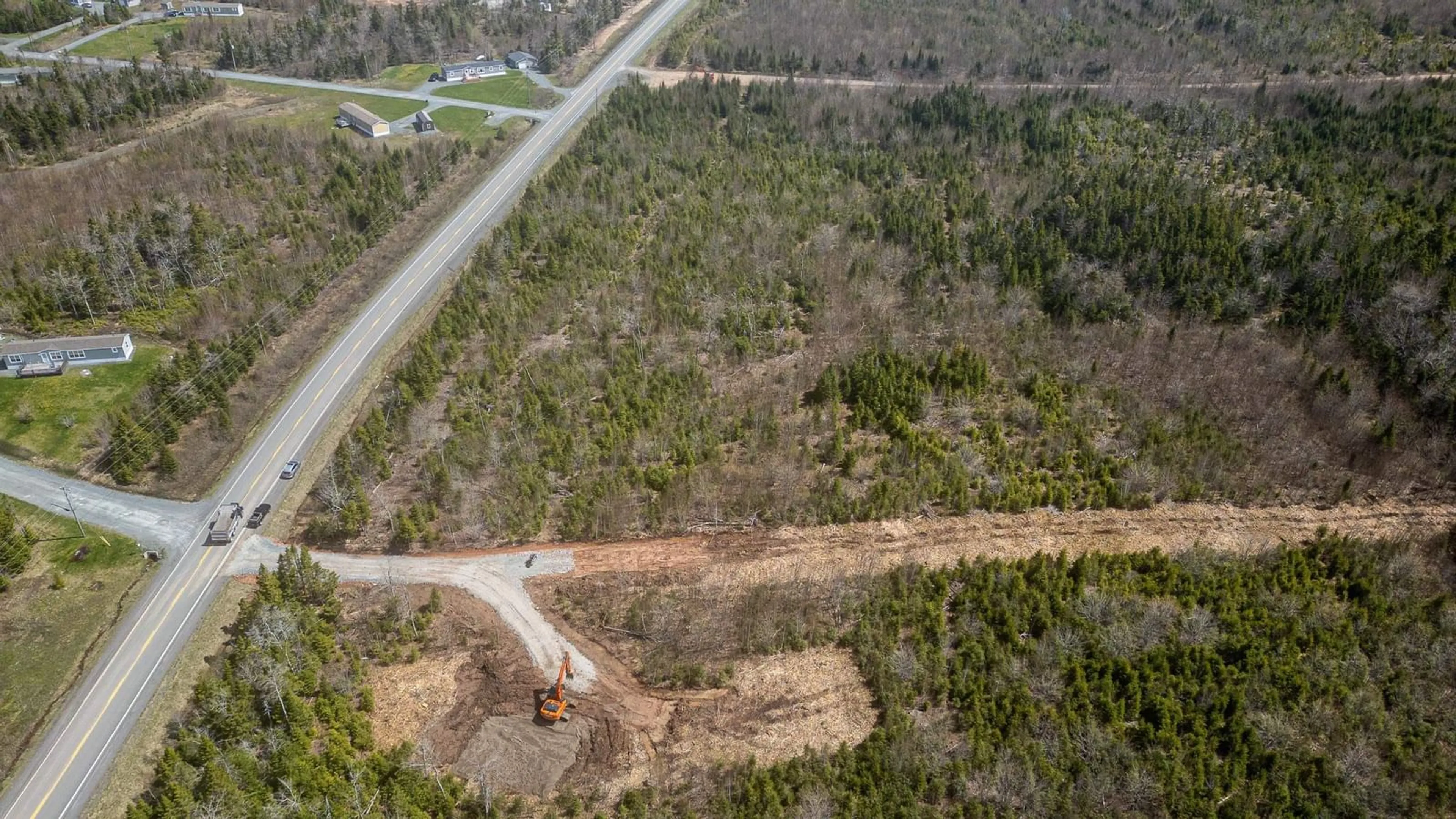 A pic from outside/outdoor area/front of a property/back of a property/a pic from drone, forest/trees view for 110 Old Guysborough Rd, Devon Nova Scotia B3T 1W8