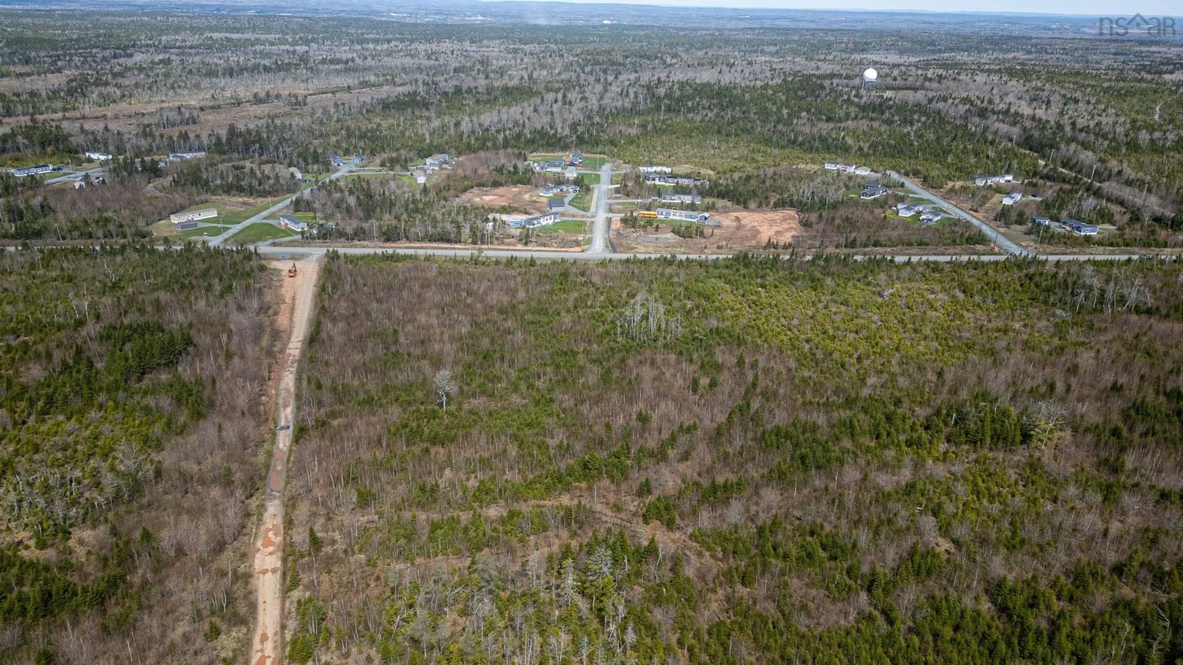 A pic from outside/outdoor area/front of a property/back of a property/a pic from drone, forest/trees view for 110 Old Guysborough Rd, Devon Nova Scotia B3T 1W8