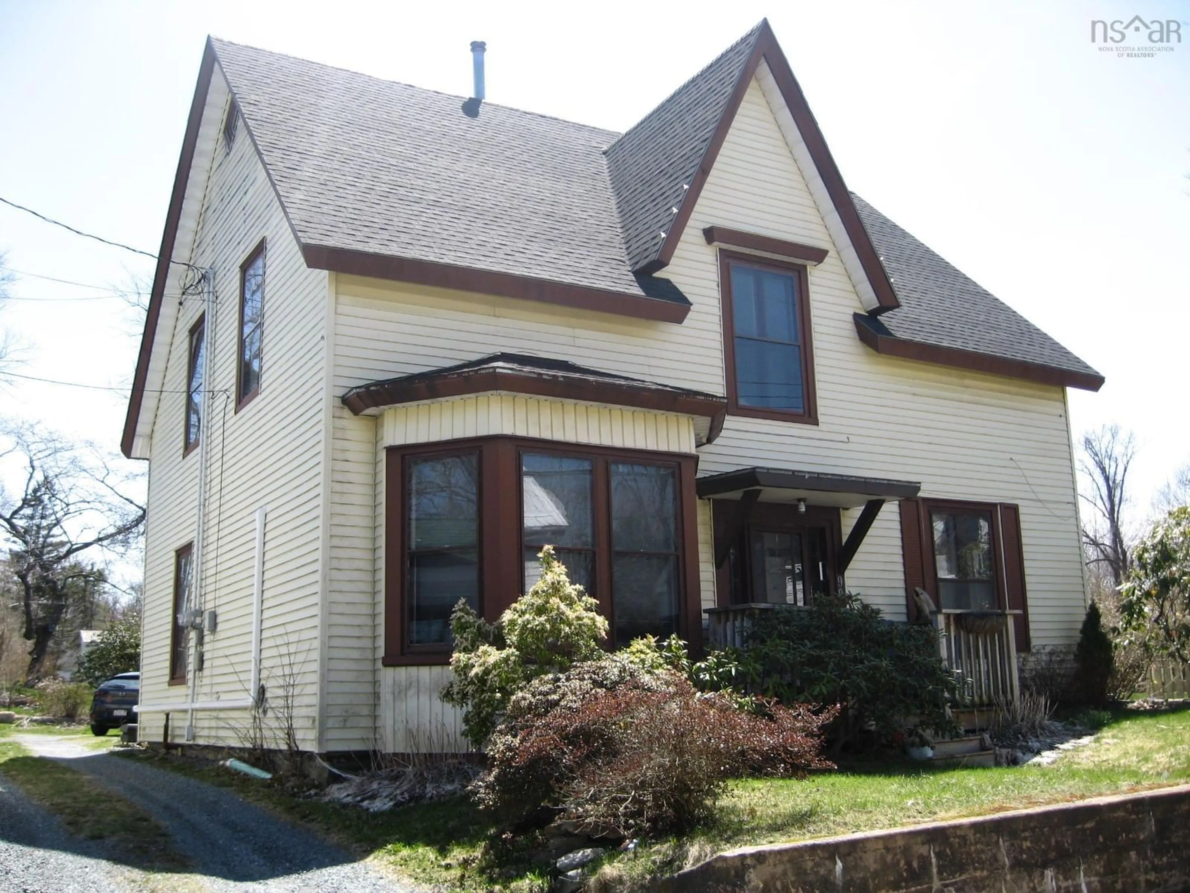 Home with vinyl exterior material, street for 99 Main St, Liverpool Nova Scotia B0T 1K0