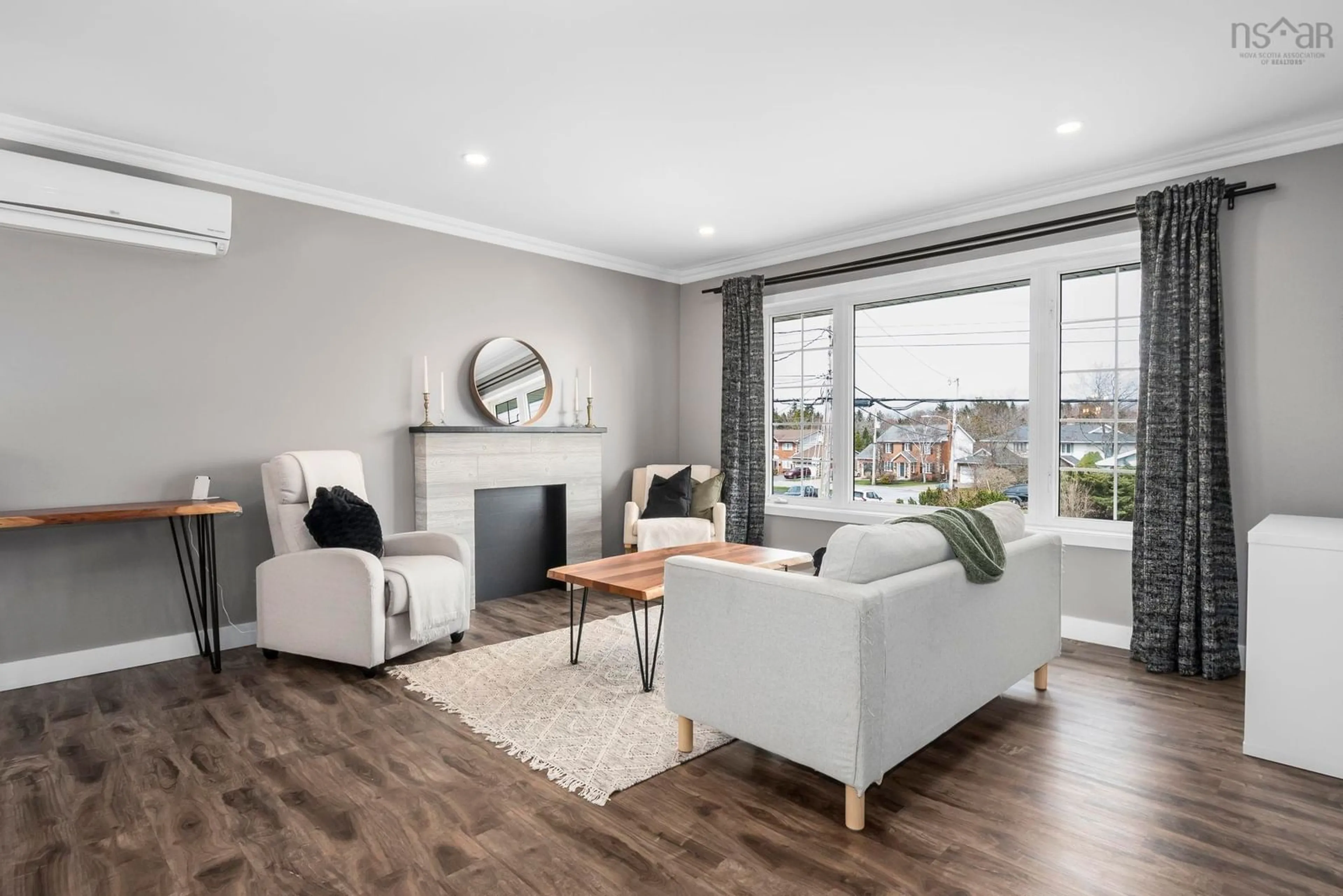 Living room with furniture, wood/laminate floor for 438 Colby Dr, Dartmouth Nova Scotia B2V 2K6