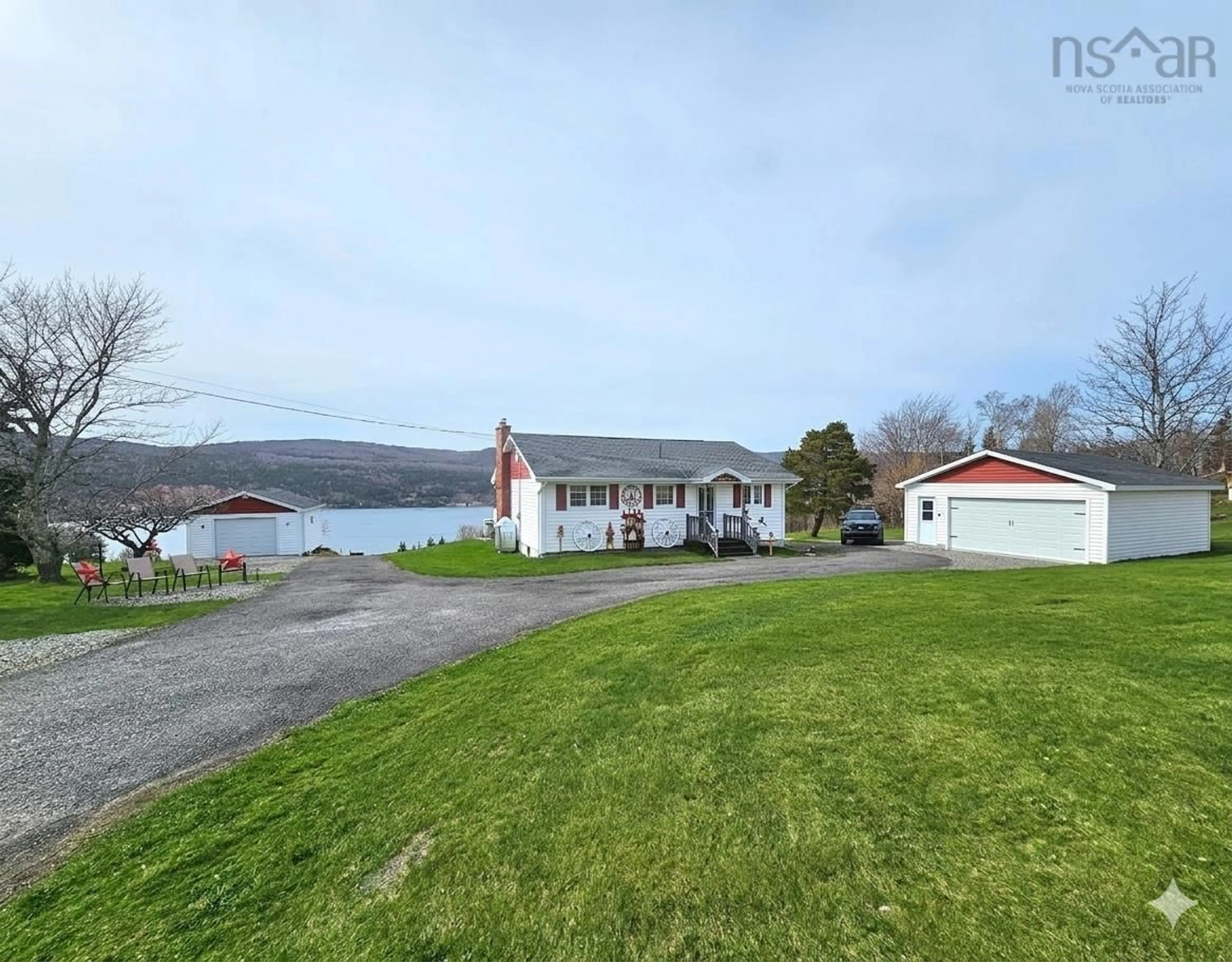 A pic from outside/outdoor area/front of a property/back of a property/a pic from drone, water/lake/river/ocean view for 868 Highway 105, Boularderie East Nova Scotia B1X 1J5