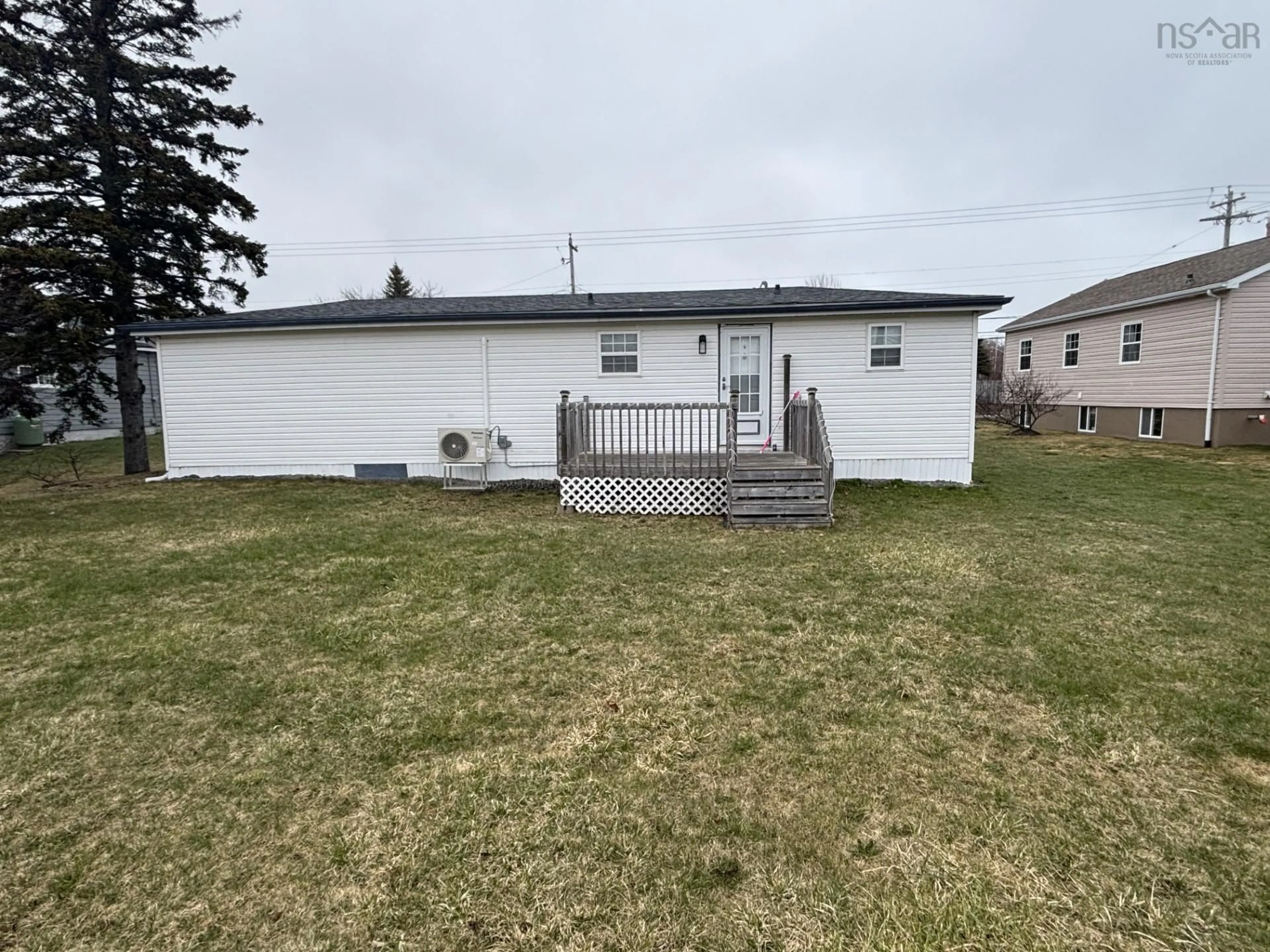 A pic from outside/outdoor area/front of a property/back of a property/a pic from drone, unknown for 116 Fraser Ave, Sydney Mines Nova Scotia B1V 2C5