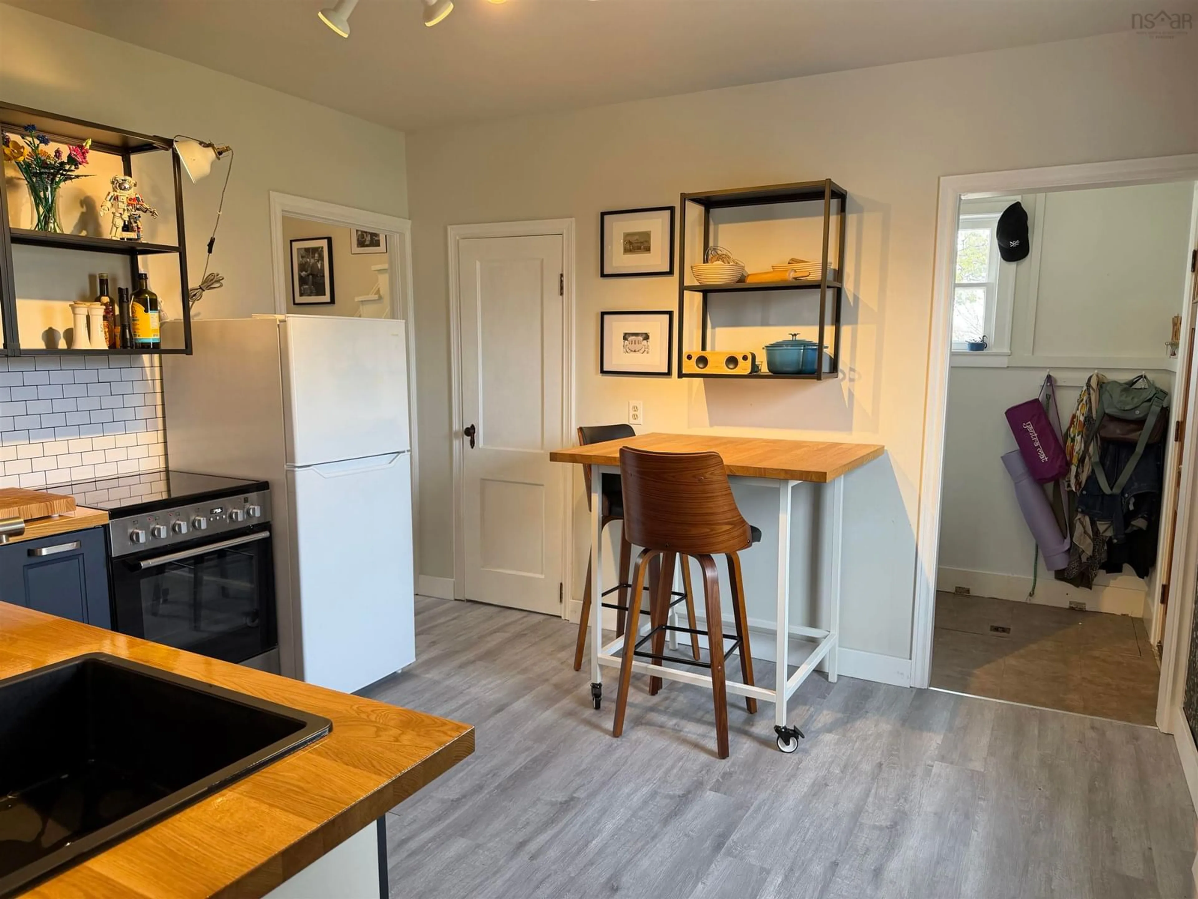 Open concept kitchen, wood/laminate floor for 1804 Victoria St, Westville Nova Scotia B0K 2A0