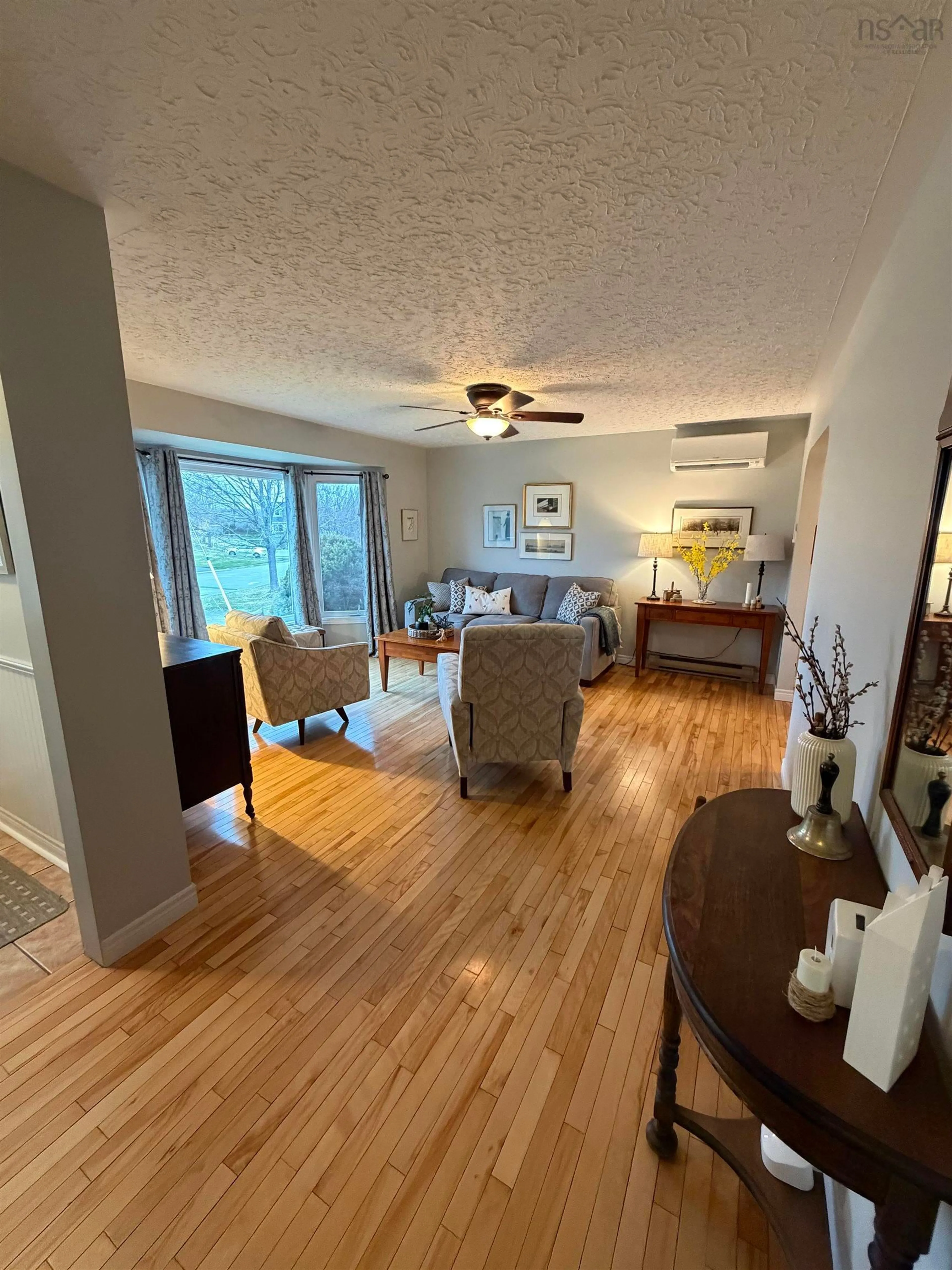 Living room with furniture, wood/laminate floor for 2 Sunrise Cres, Antigonish Nova Scotia B2G 2R7
