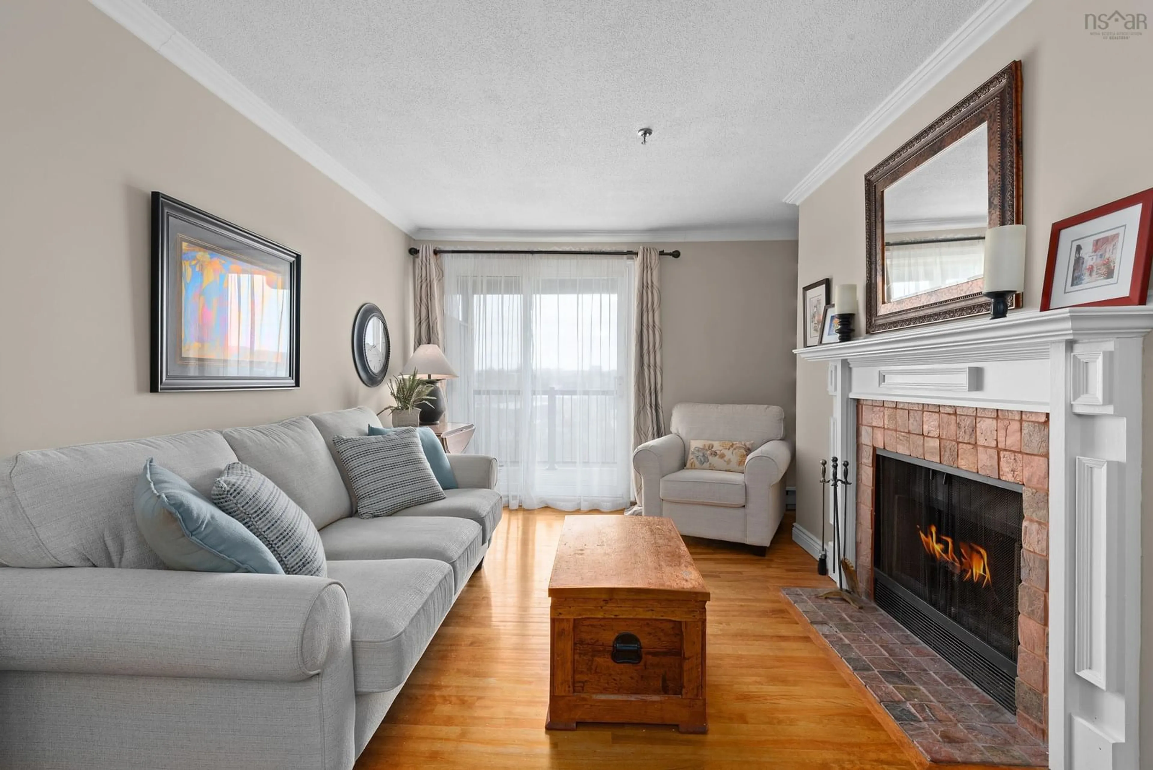 Living room with furniture, wood/laminate floor for 3600 John Parr Dr #315, Halifax Nova Scotia B3R 5V3