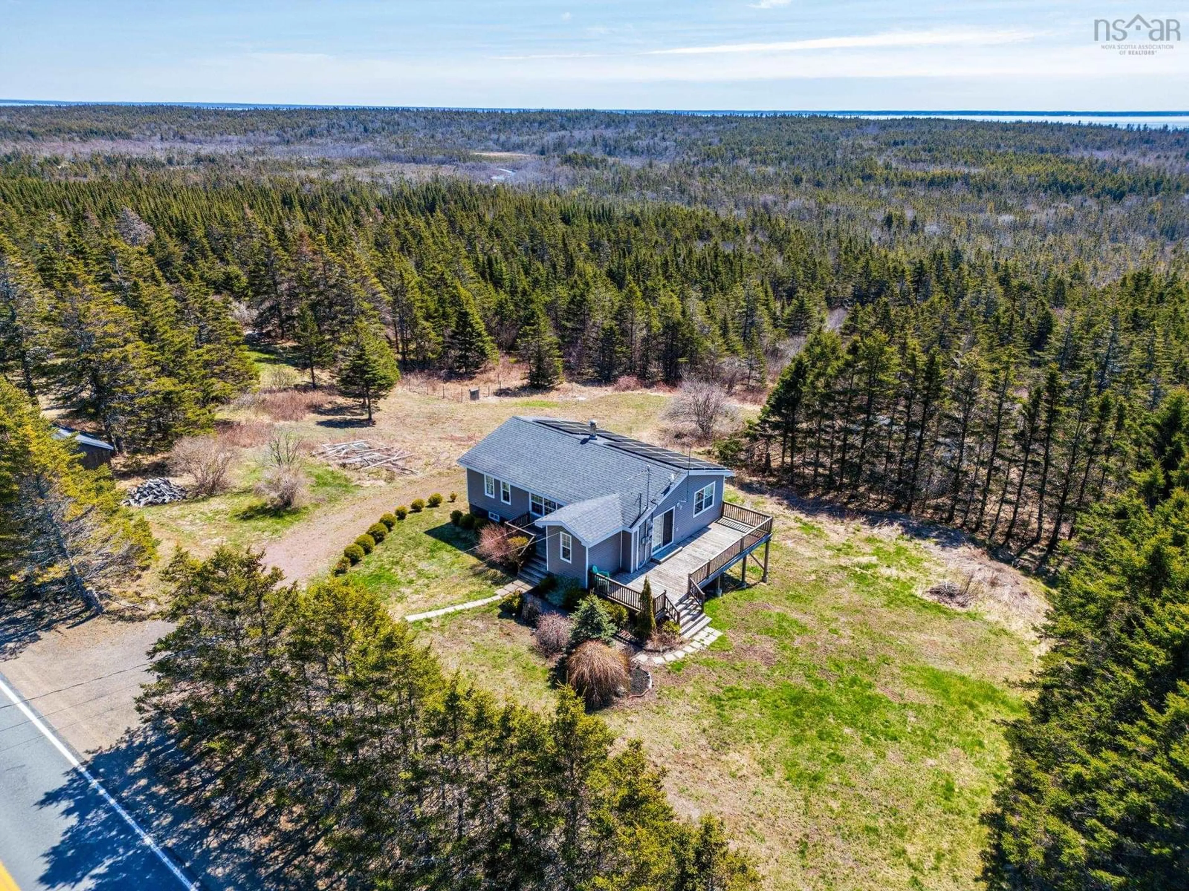 A pic from outside/outdoor area/front of a property/back of a property/a pic from drone, water/lake/river/ocean view for 662 Highway 217, Freeport Nova Scotia B0V 1B0