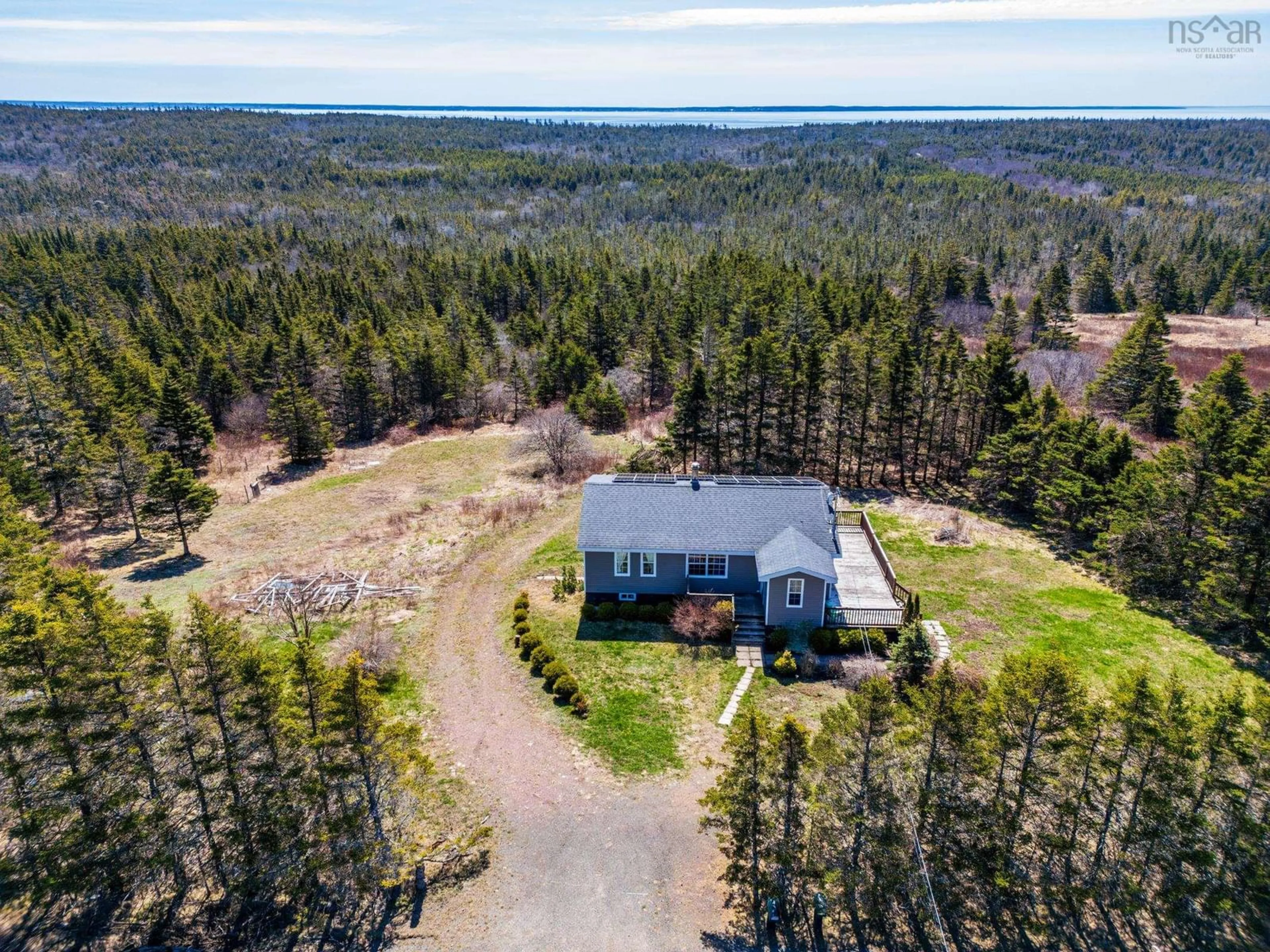 A pic from outside/outdoor area/front of a property/back of a property/a pic from drone, unknown for 662 Highway 217, Freeport Nova Scotia B0V 1B0