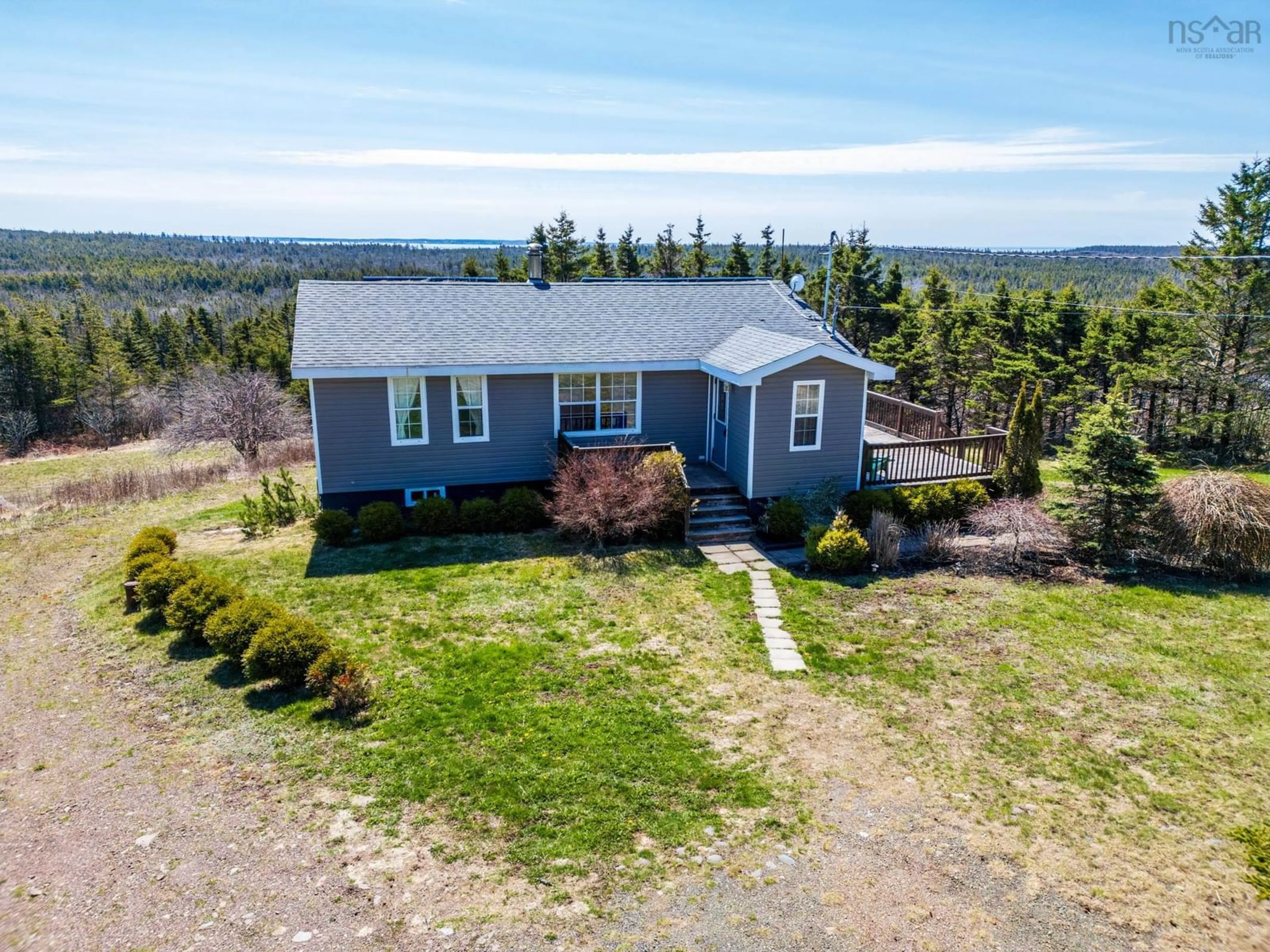 A pic from outside/outdoor area/front of a property/back of a property/a pic from drone, water/lake/river/ocean view for 662 Highway 217, Freeport Nova Scotia B0V 1B0