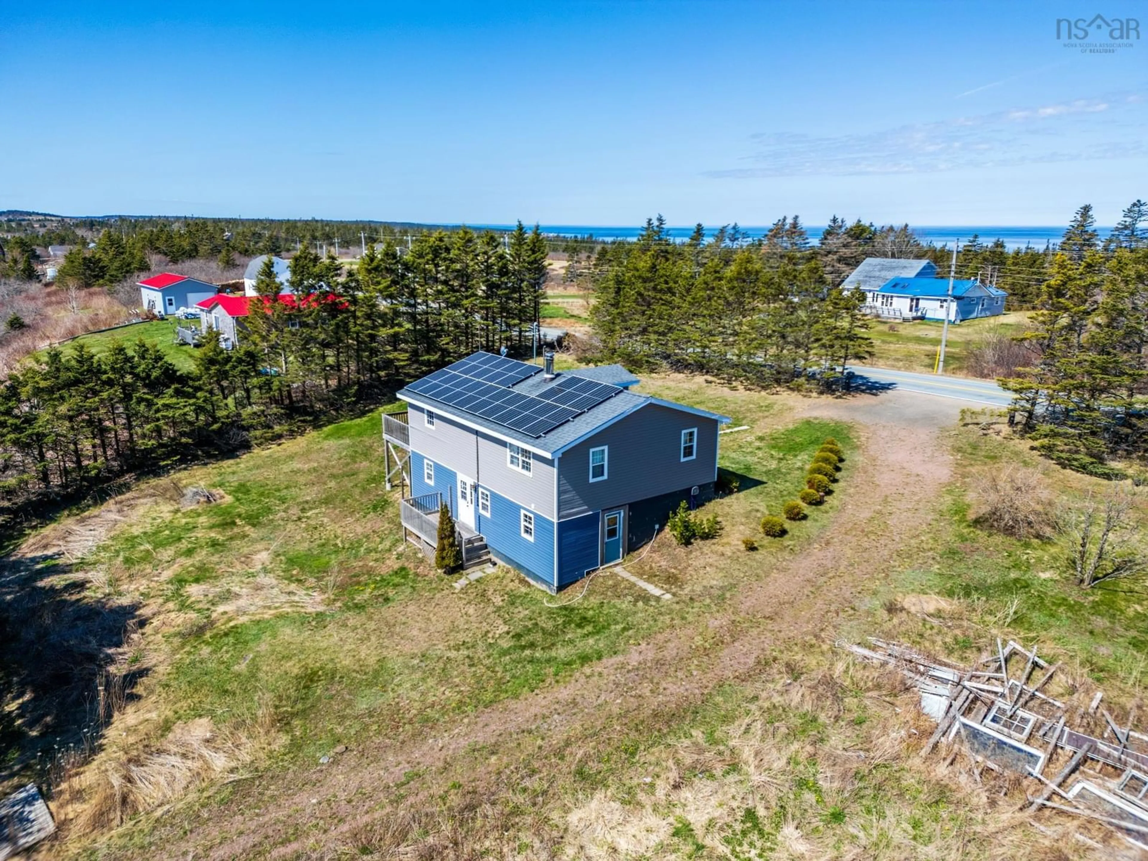 A pic from outside/outdoor area/front of a property/back of a property/a pic from drone, water/lake/river/ocean view for 662 Highway 217, Freeport Nova Scotia B0V 1B0