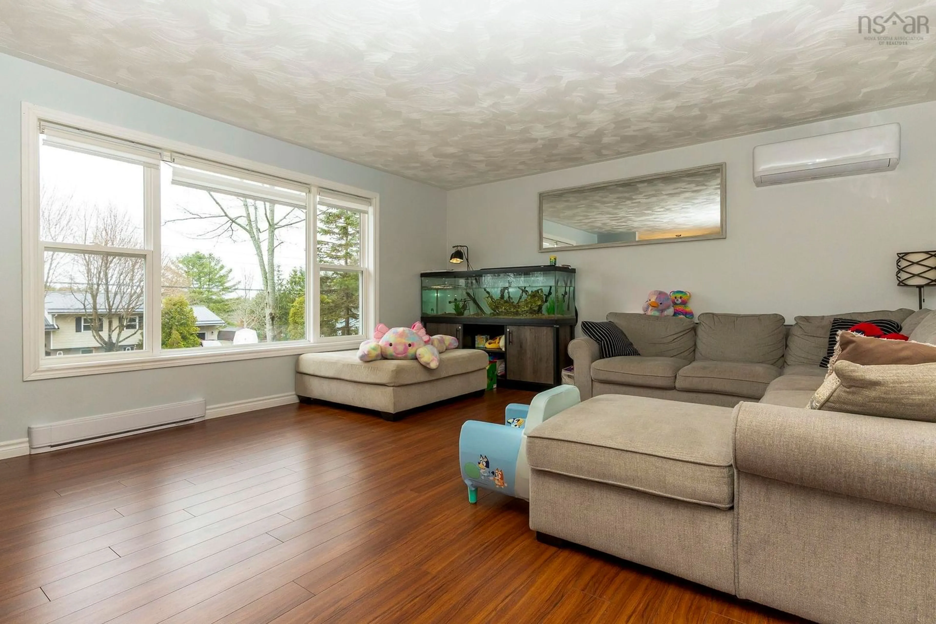 Living room with furniture, wood/laminate floor for 861 Julie Drive, Kingston Nova Scotia B0P 1R0