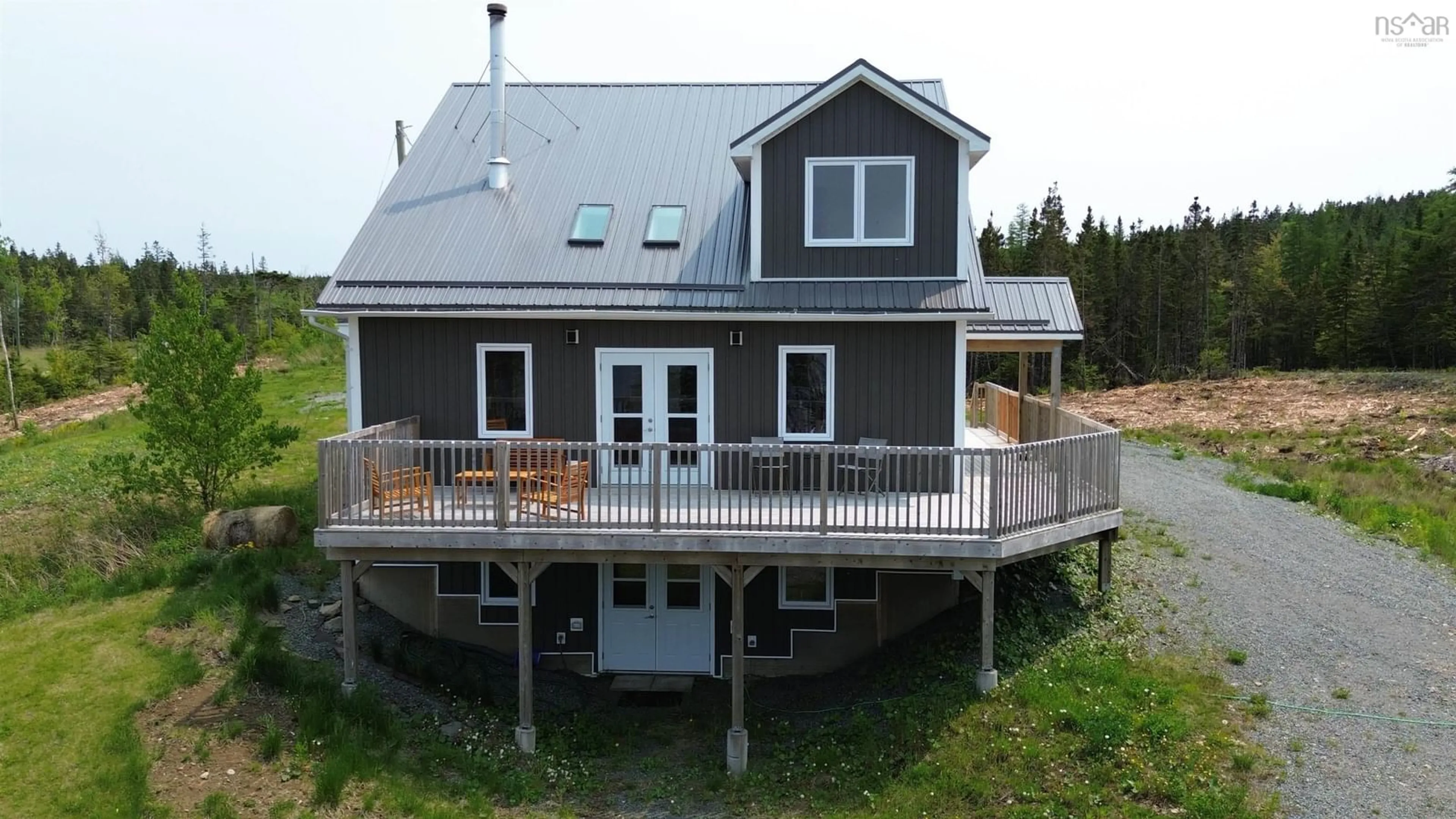 Home with vinyl exterior material, unknown for 1589 Corbetts Cove Rd, Barra Head Nova Scotia B0E 3B0