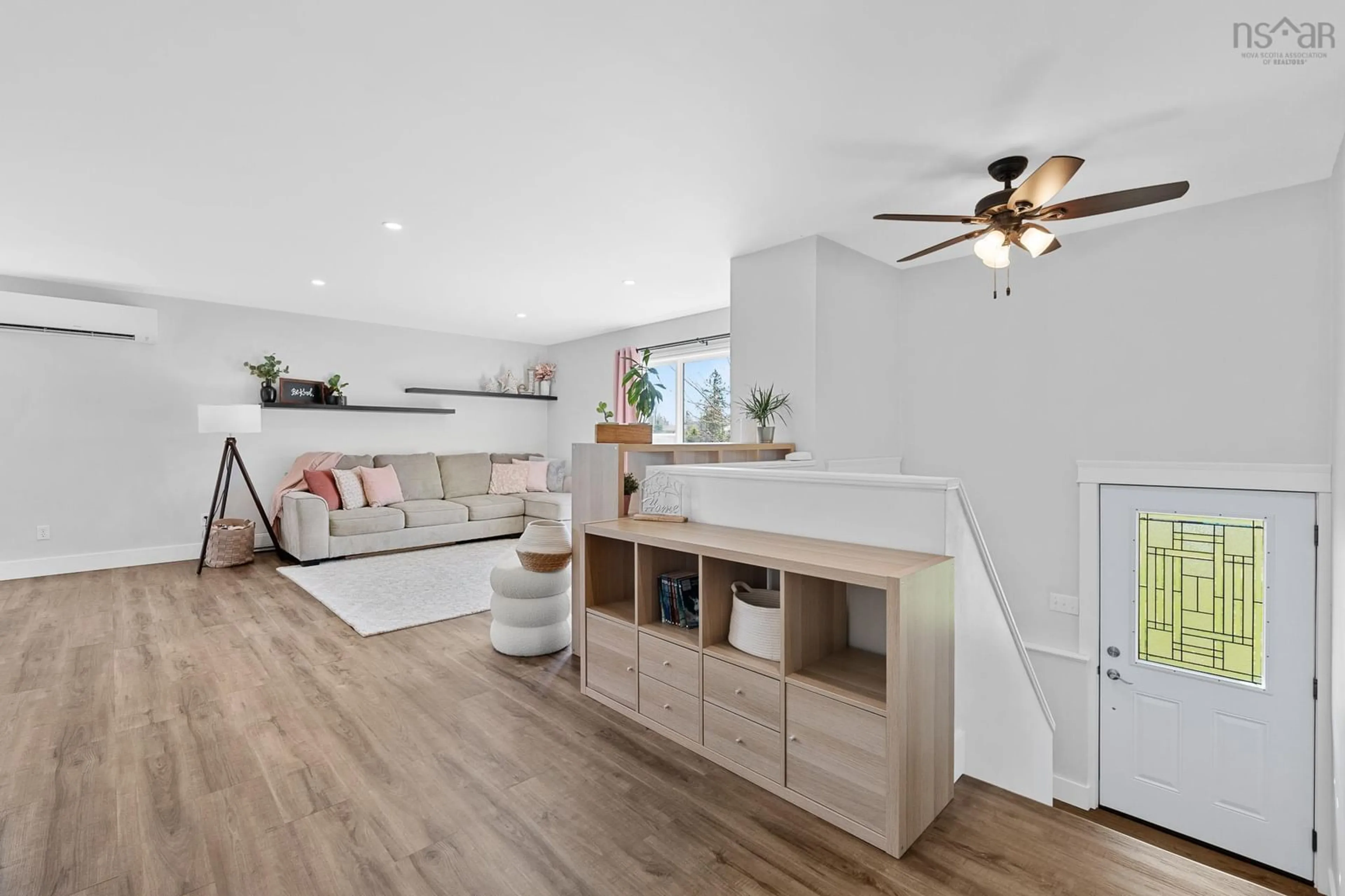 Living room with furniture, wood/laminate floor for 23 Retson Dr, Bible Hill Nova Scotia B2N 6H4