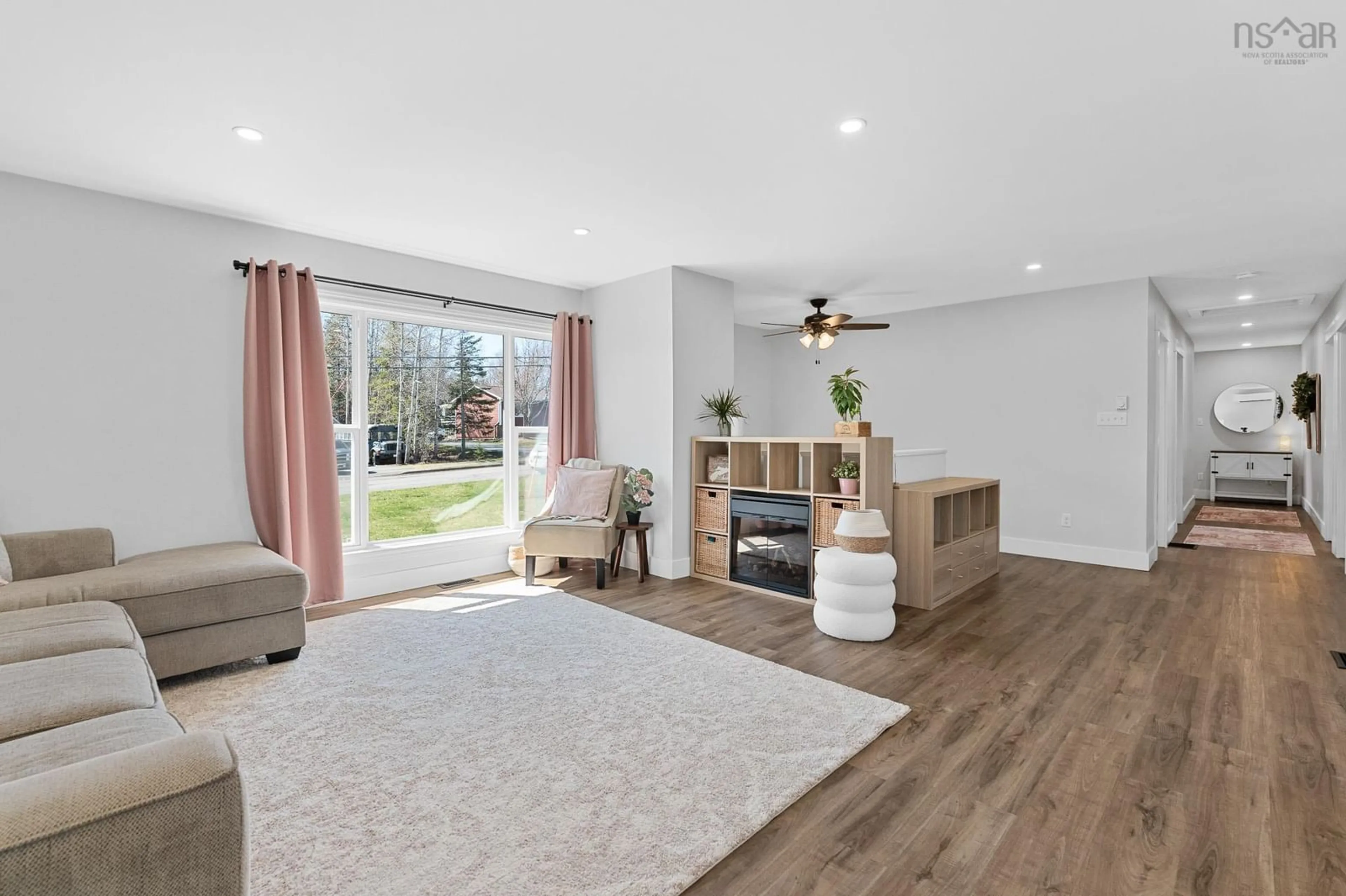 Living room with furniture, wood/laminate floor for 23 Retson Dr, Bible Hill Nova Scotia B2N 6H4