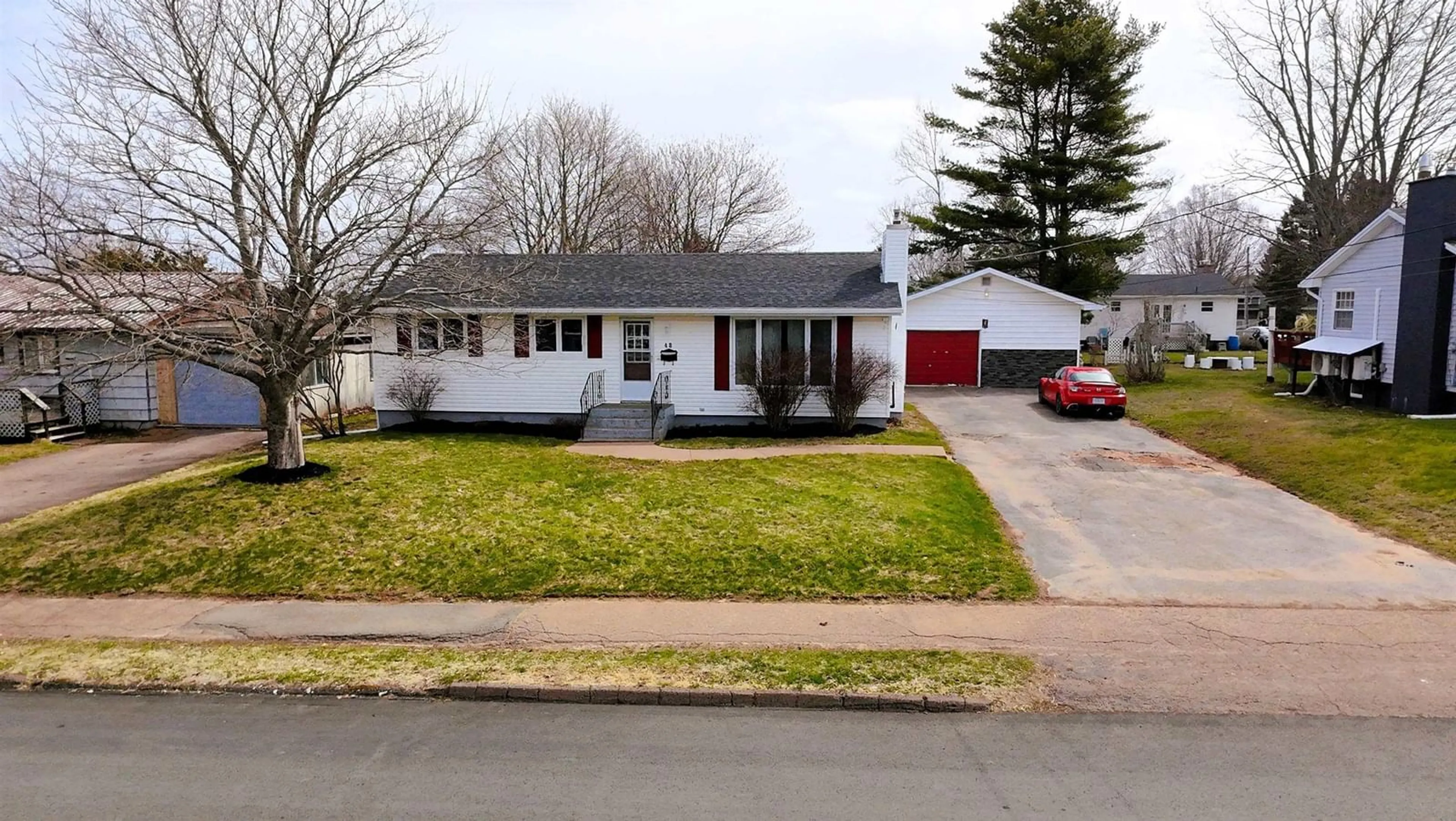 Home with vinyl exterior material, street for 48 Birch Street, Salmon River Nova Scotia B2N 4X2