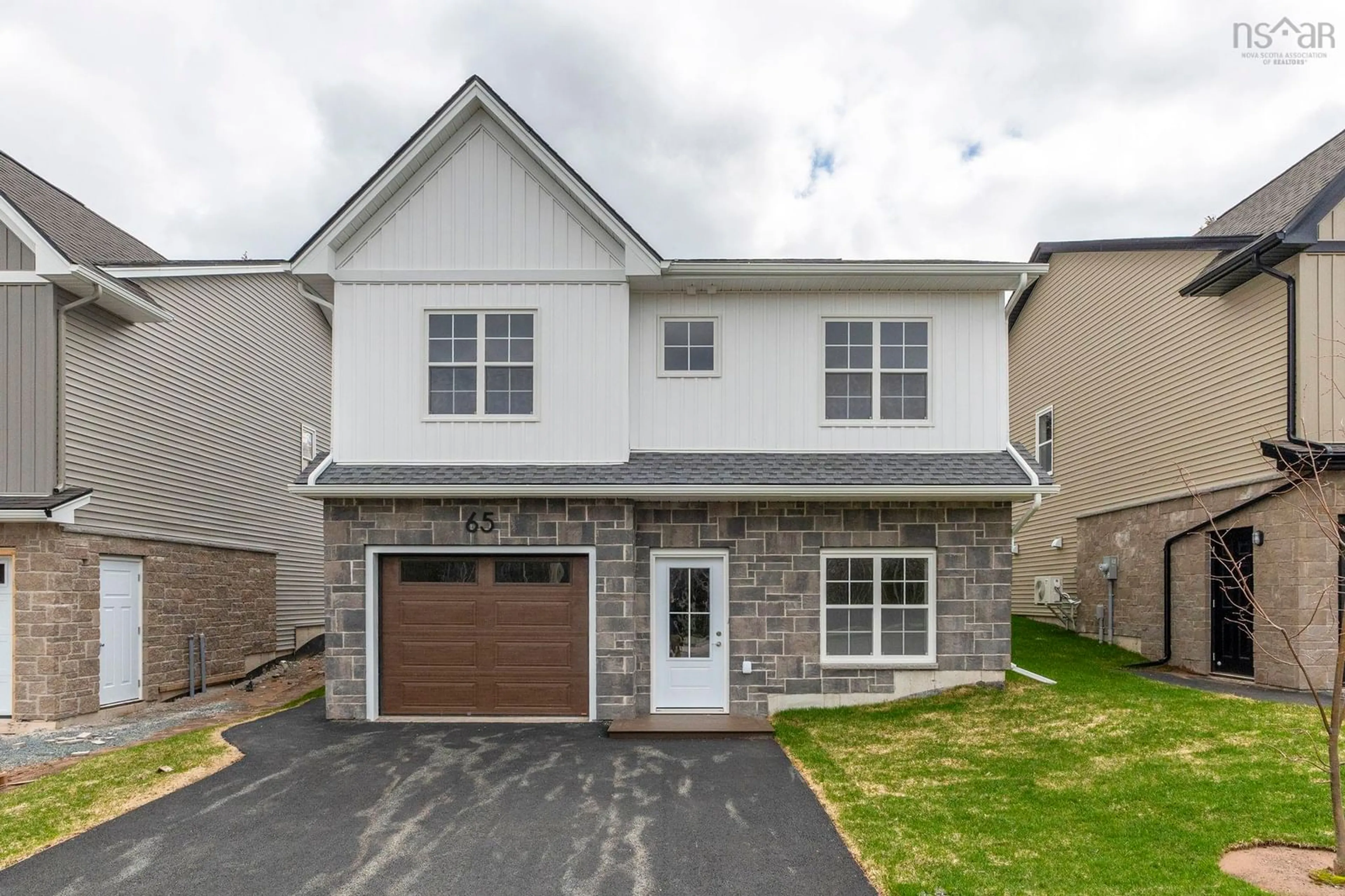 Home with brick exterior material, street for 65 Gardenia Way #GW-39, Dartmouth Nova Scotia B2X 0C7