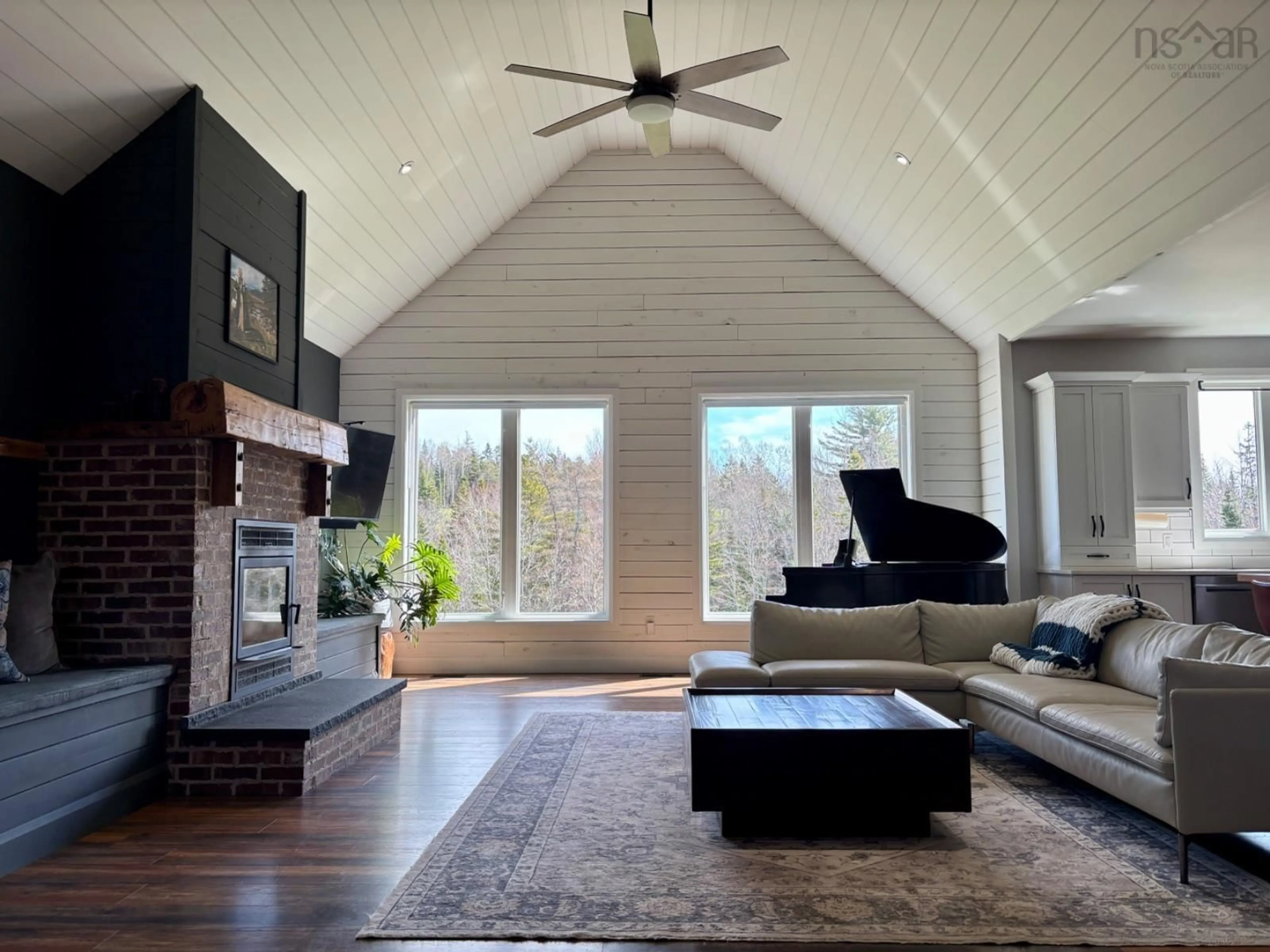 Living room with furniture, wood/laminate floor for 54 Craig Dr, Dutch Settlement Nova Scotia B2S 2E5