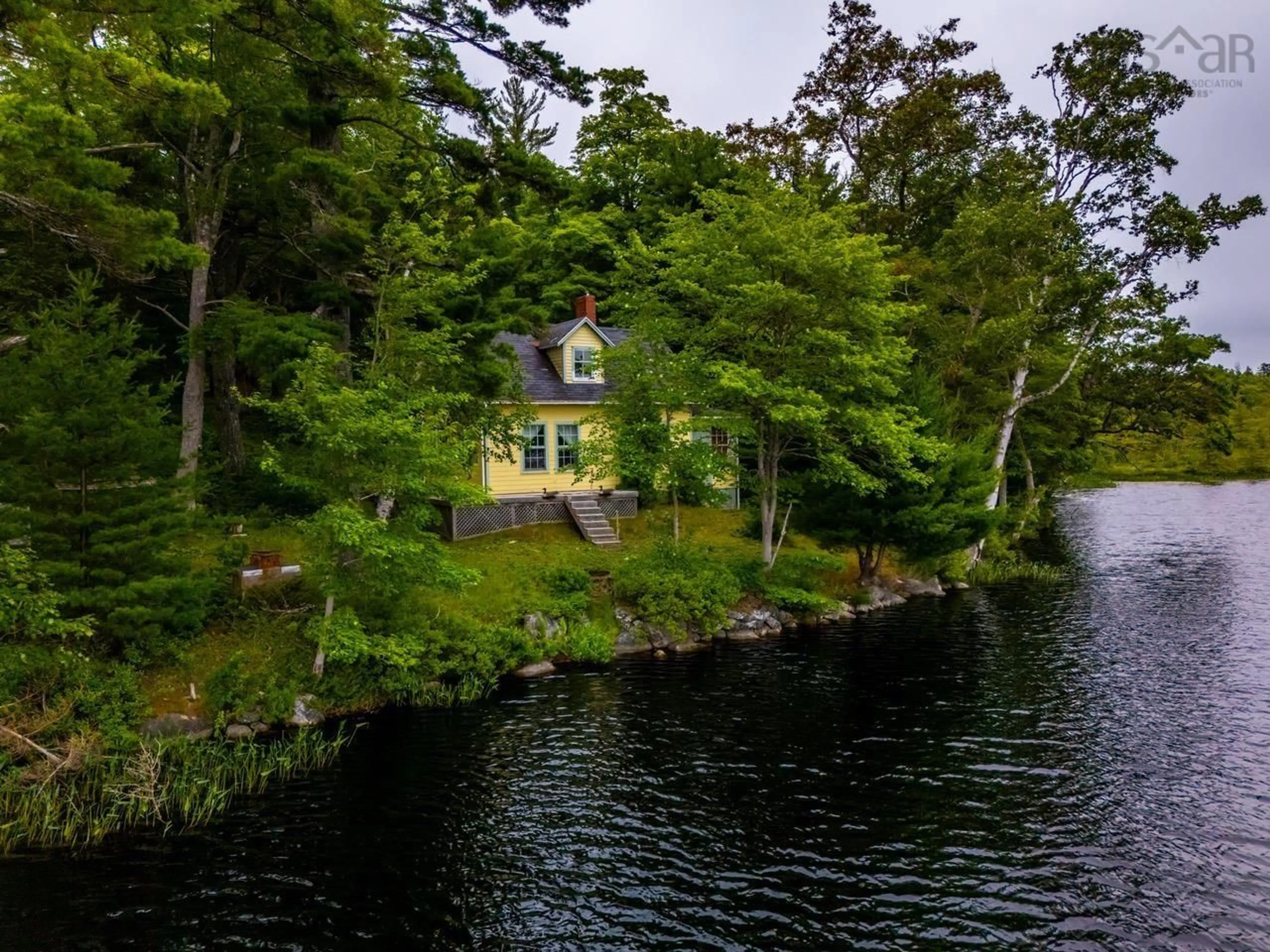 A pic from outside/outdoor area/front of a property/back of a property/a pic from drone, water/lake/river/ocean view for 112 Thomas Lake Rd, Milford Nova Scotia B0S 1A0