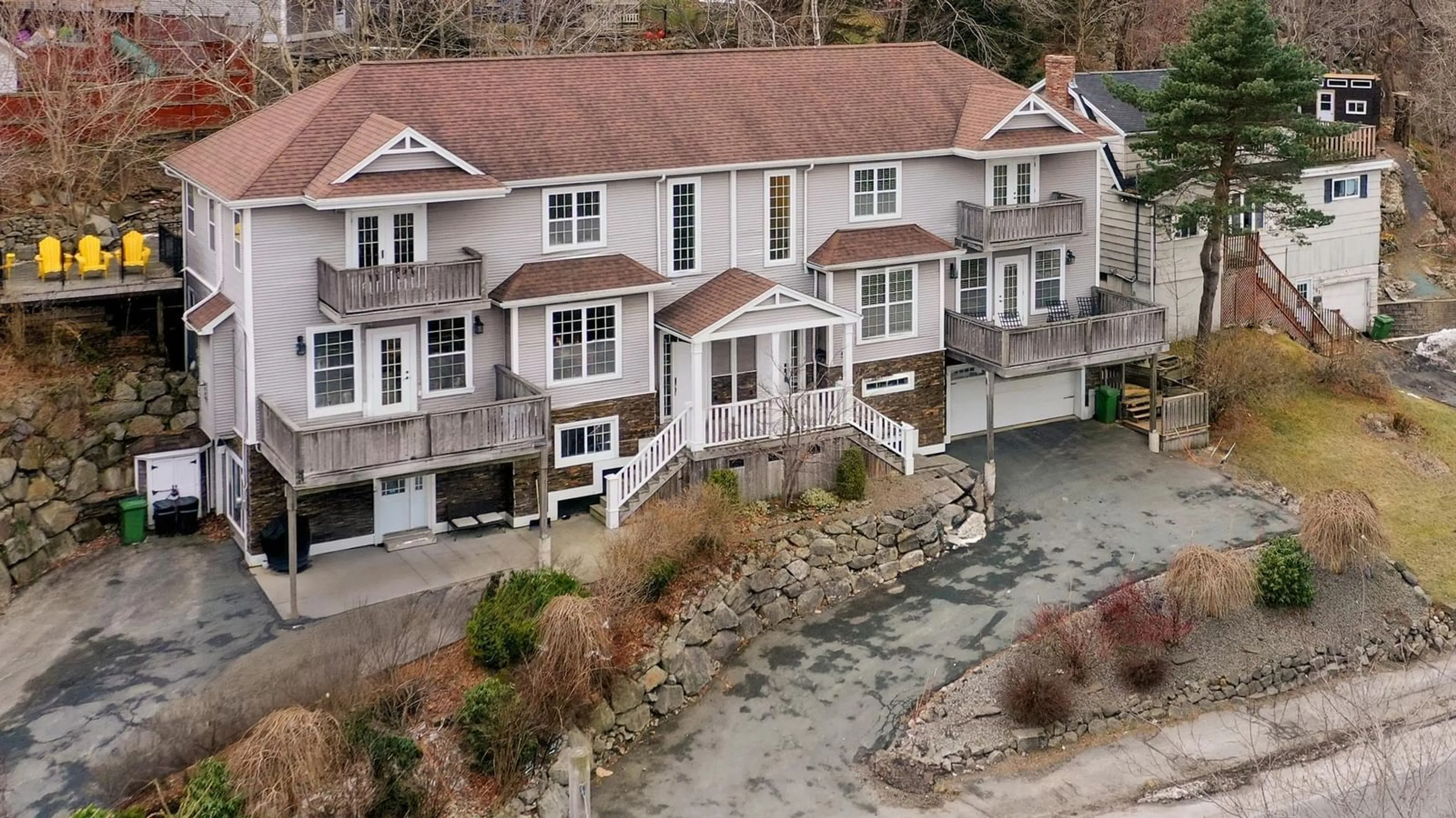 A pic from outside/outdoor area/front of a property/back of a property/a pic from drone, unknown for 57 Herring Cove Rd, Halifax Nova Scotia B3N 1P9
