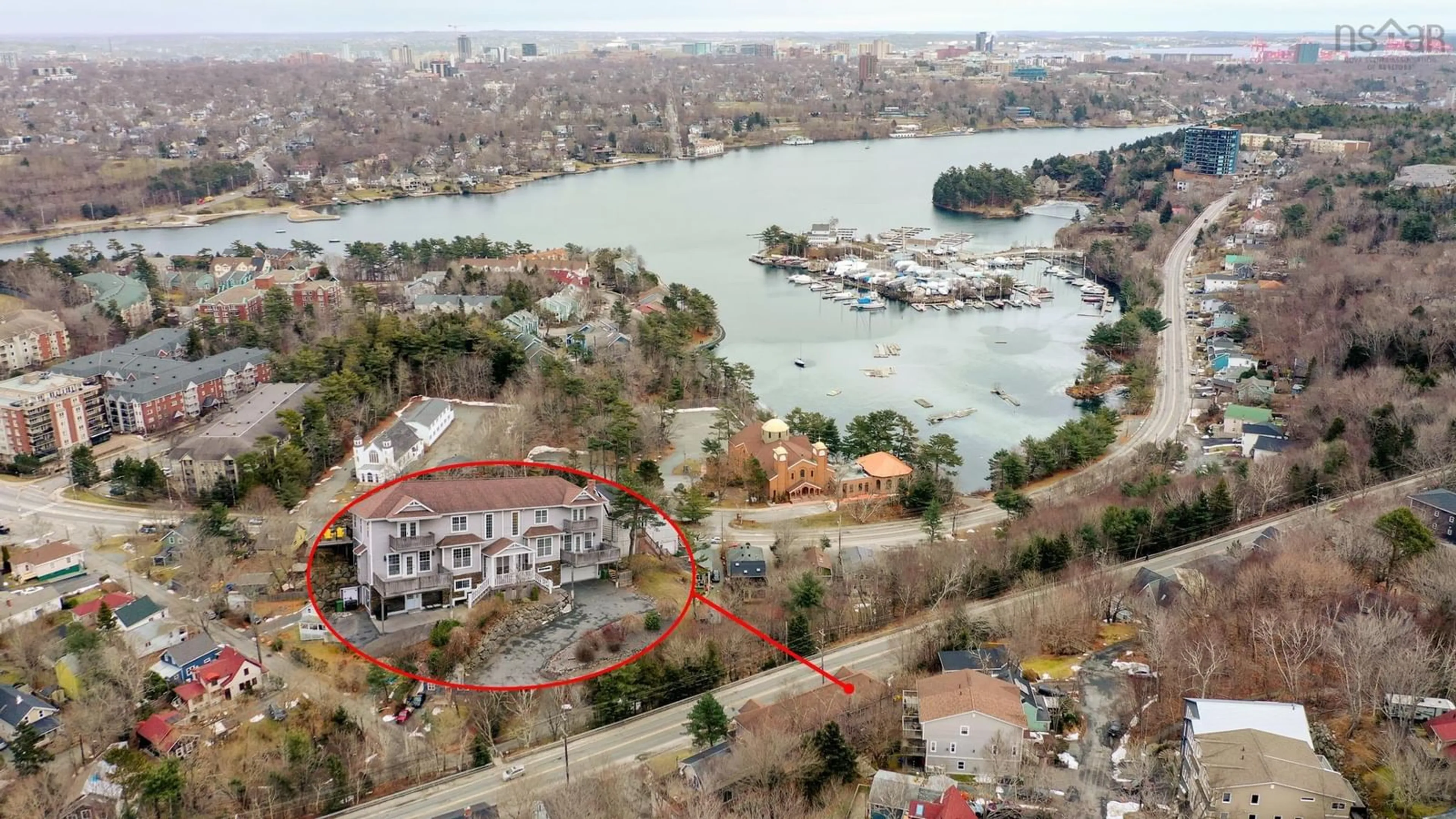 A pic from outside/outdoor area/front of a property/back of a property/a pic from drone, water/lake/river/ocean view for 57 Herring Cove Rd, Halifax Nova Scotia B3N 1P9