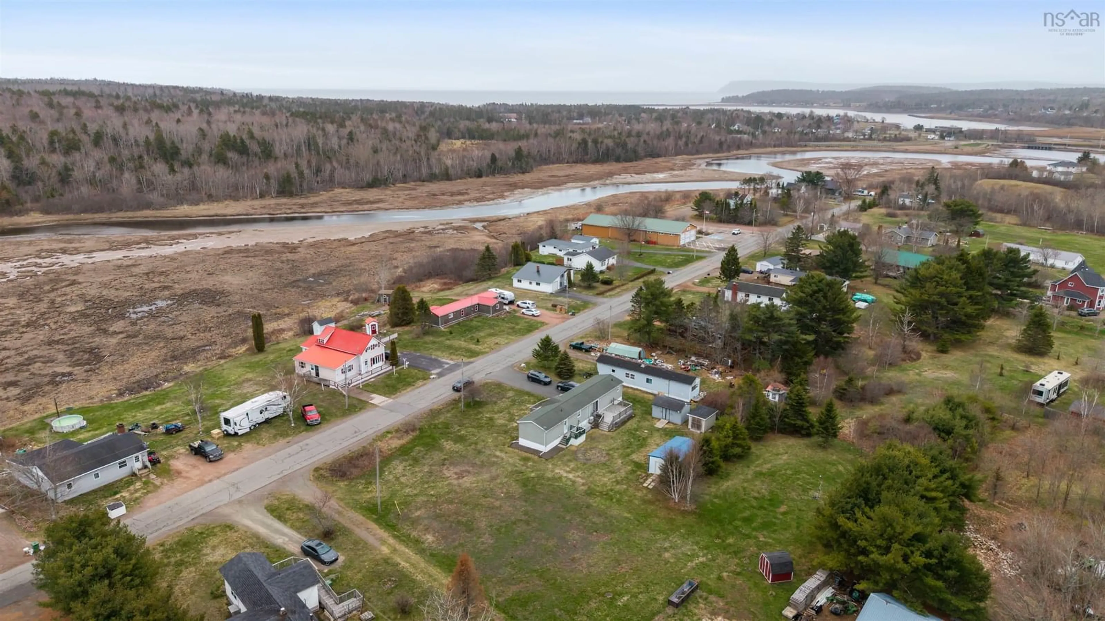 A pic from outside/outdoor area/front of a property/back of a property/a pic from drone, water/lake/river/ocean view for 307 Willow St, Parrsboro Nova Scotia B0M 1S0