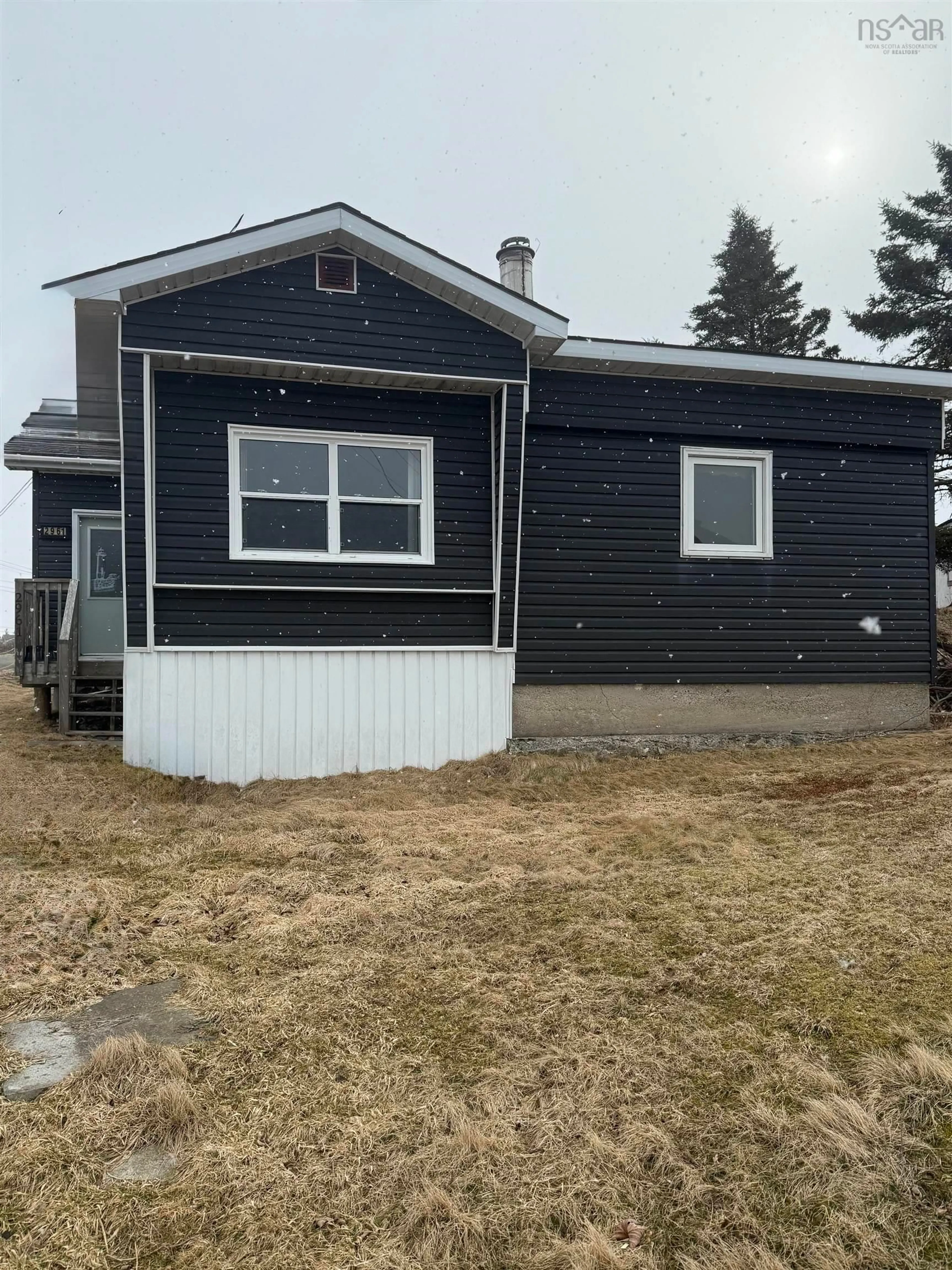 Home with vinyl exterior material, street for 2961 Main St, Lower Clarks Harbour Nova Scotia B0W 1P0