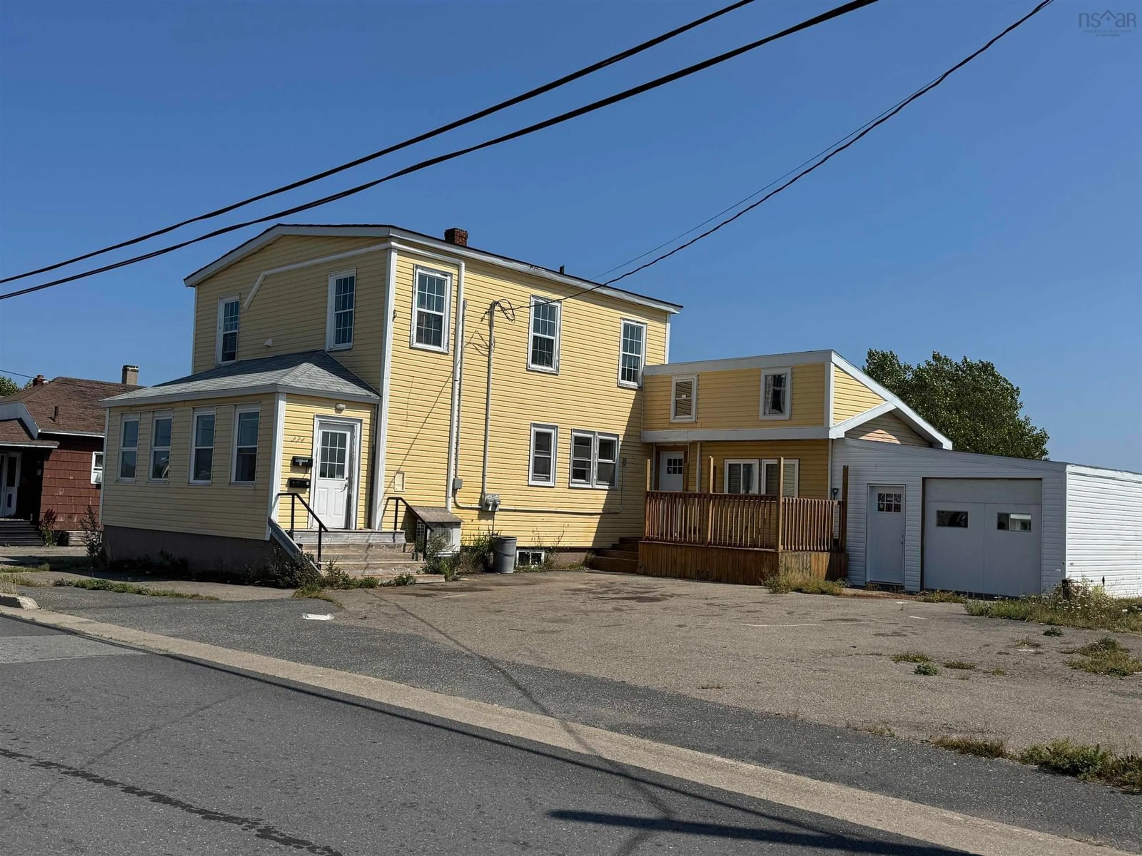 A pic from outside/outdoor area/front of a property/back of a property/a pic from drone, building for 334 Atlantic St, Sydney Mines Nova Scotia B1V 1X1