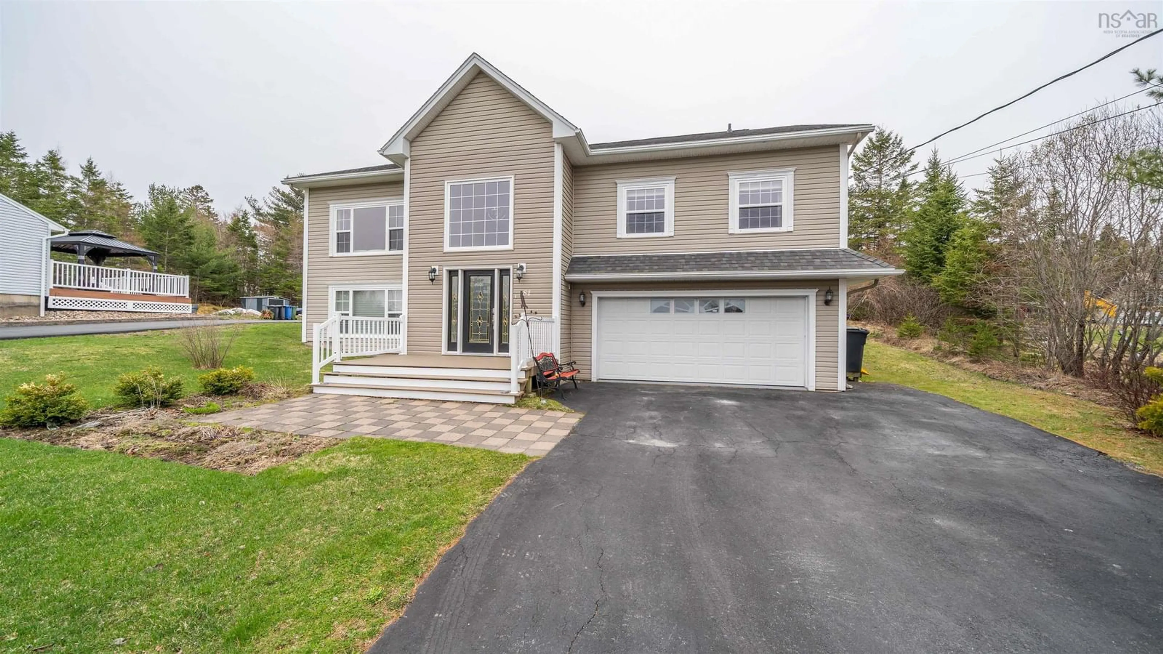 Home with vinyl exterior material, street for 81 Orchard Dr, Middle Sackville Nova Scotia B4E 3B3