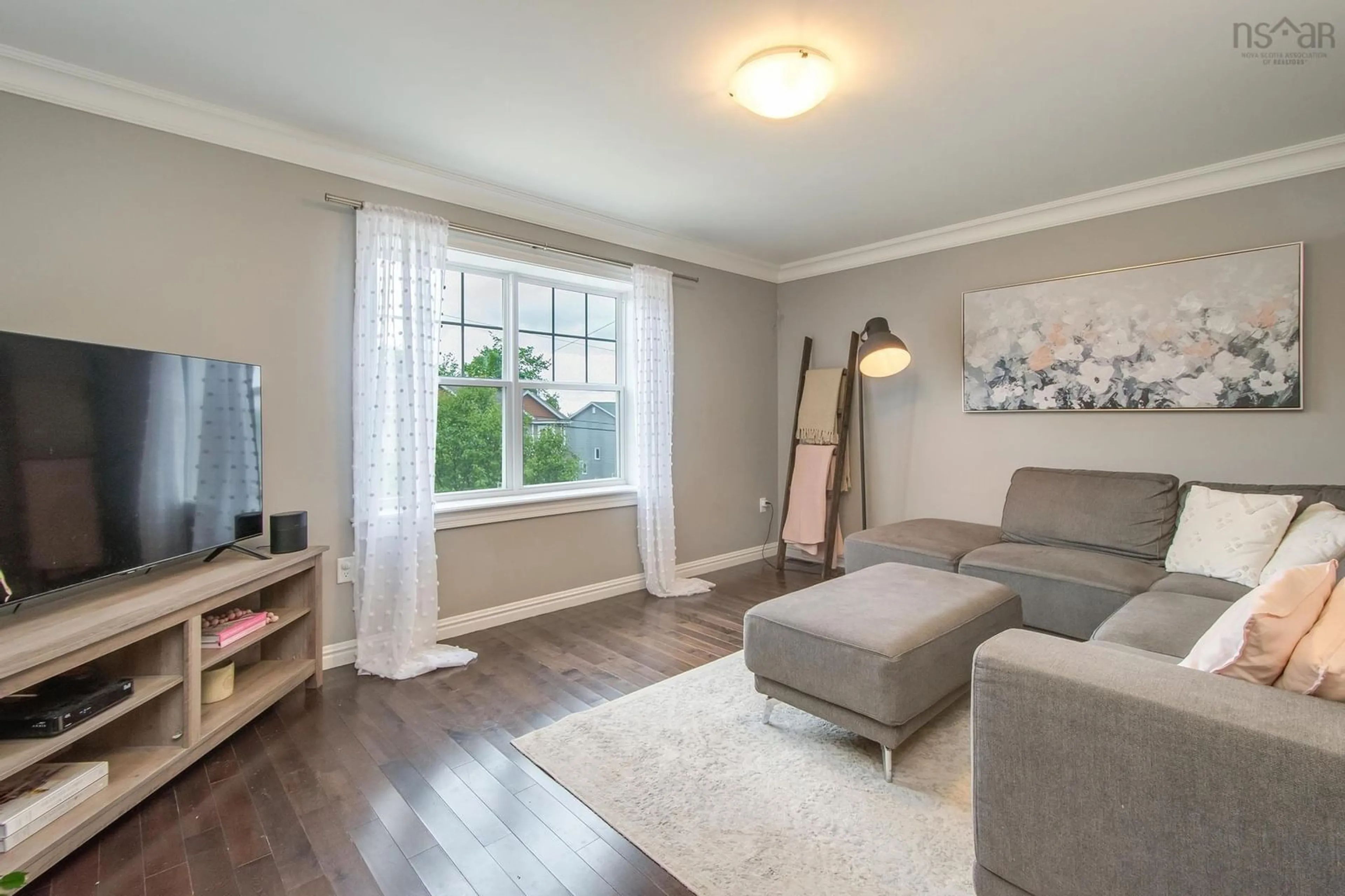 Living room with furniture, wood/laminate floor for 30 Avebury Crt, Middle Sackville Nova Scotia B4E 0E9