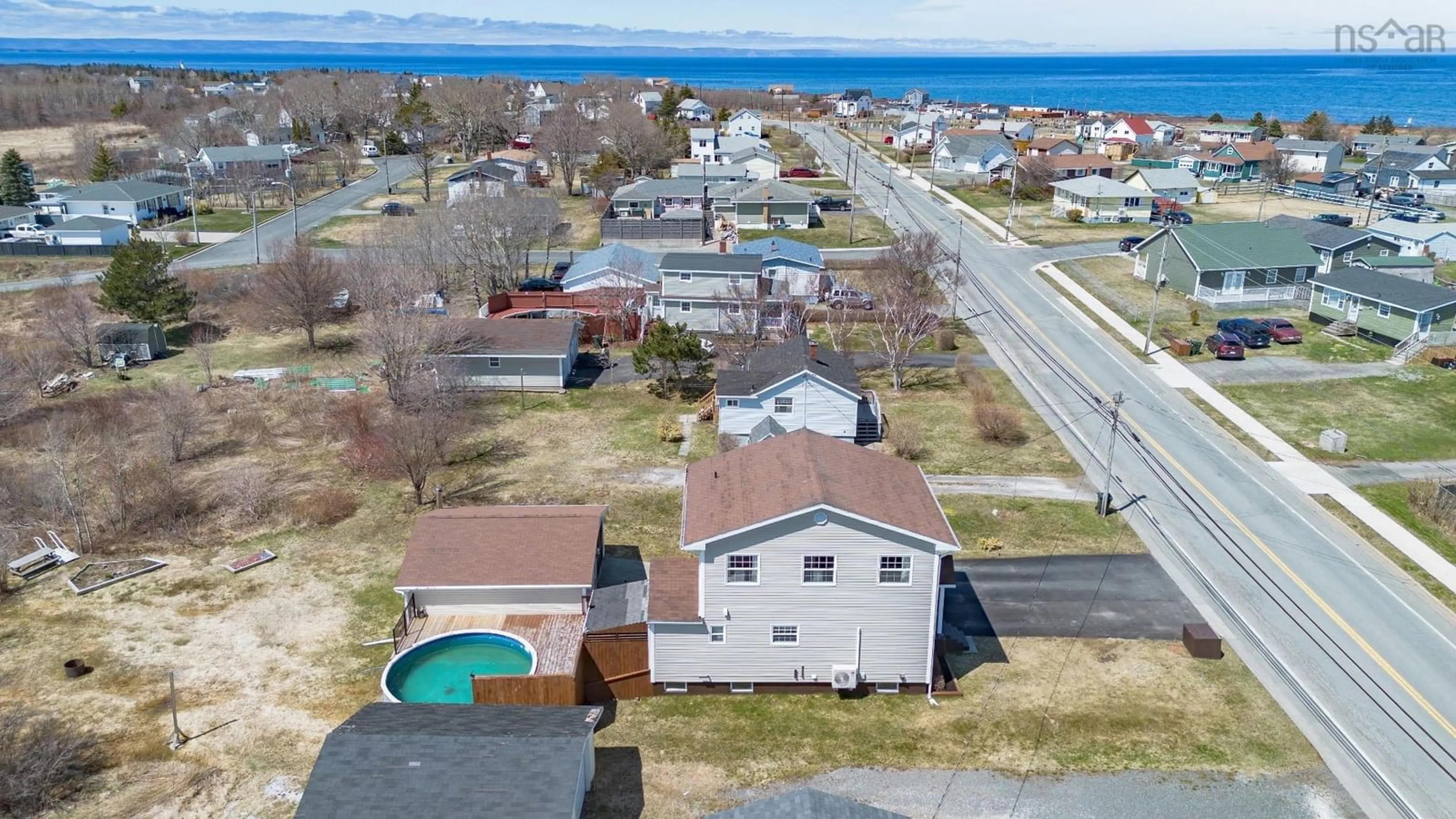 A pic from outside/outdoor area/front of a property/back of a property/a pic from drone, water/lake/river/ocean view for 3752 Ellsworth Ave, New Waterford Nova Scotia B1H 2H8