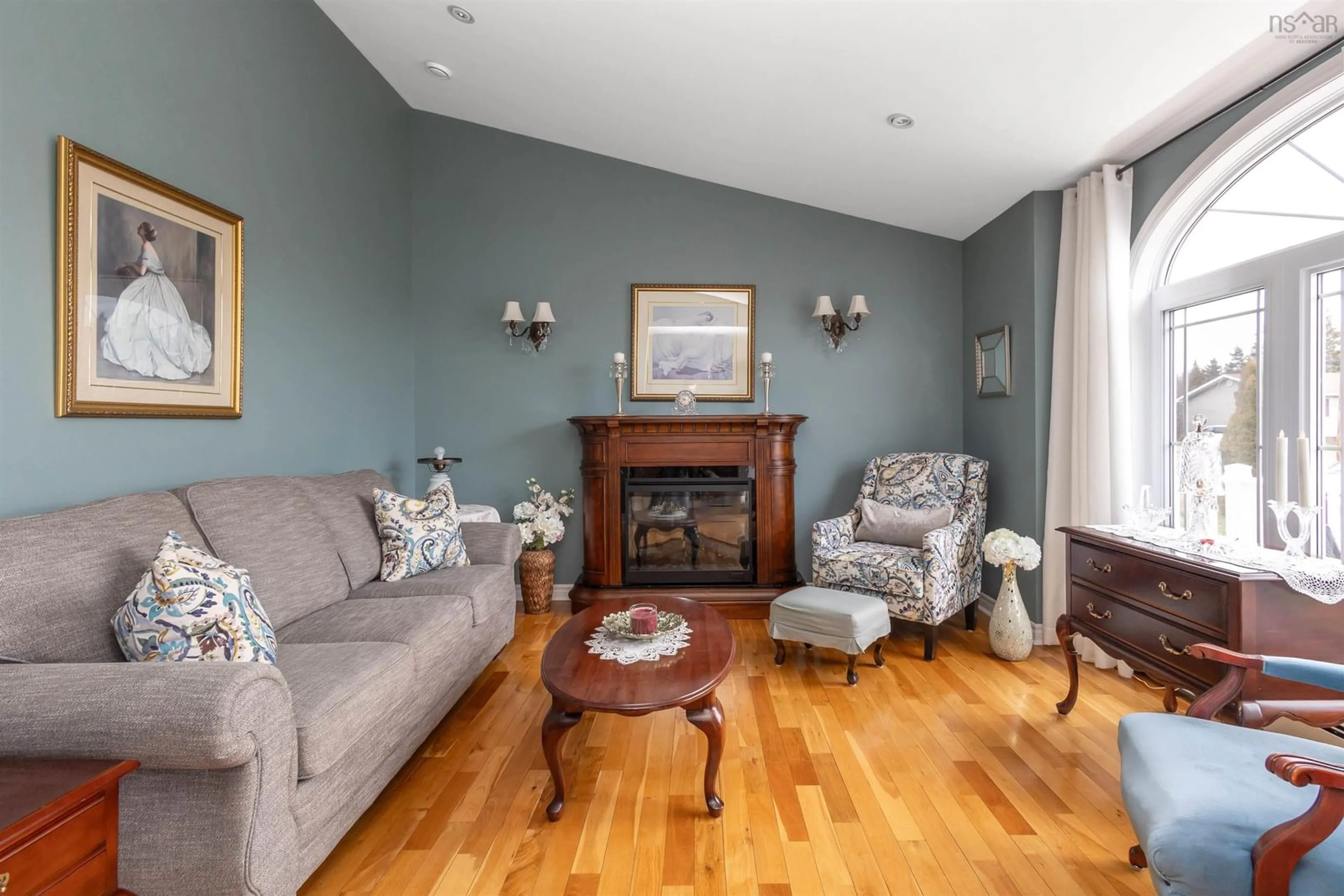 Living room with furniture, wood/laminate floor for 2 Willis Ave, Coxheath Nova Scotia B1R 0A3