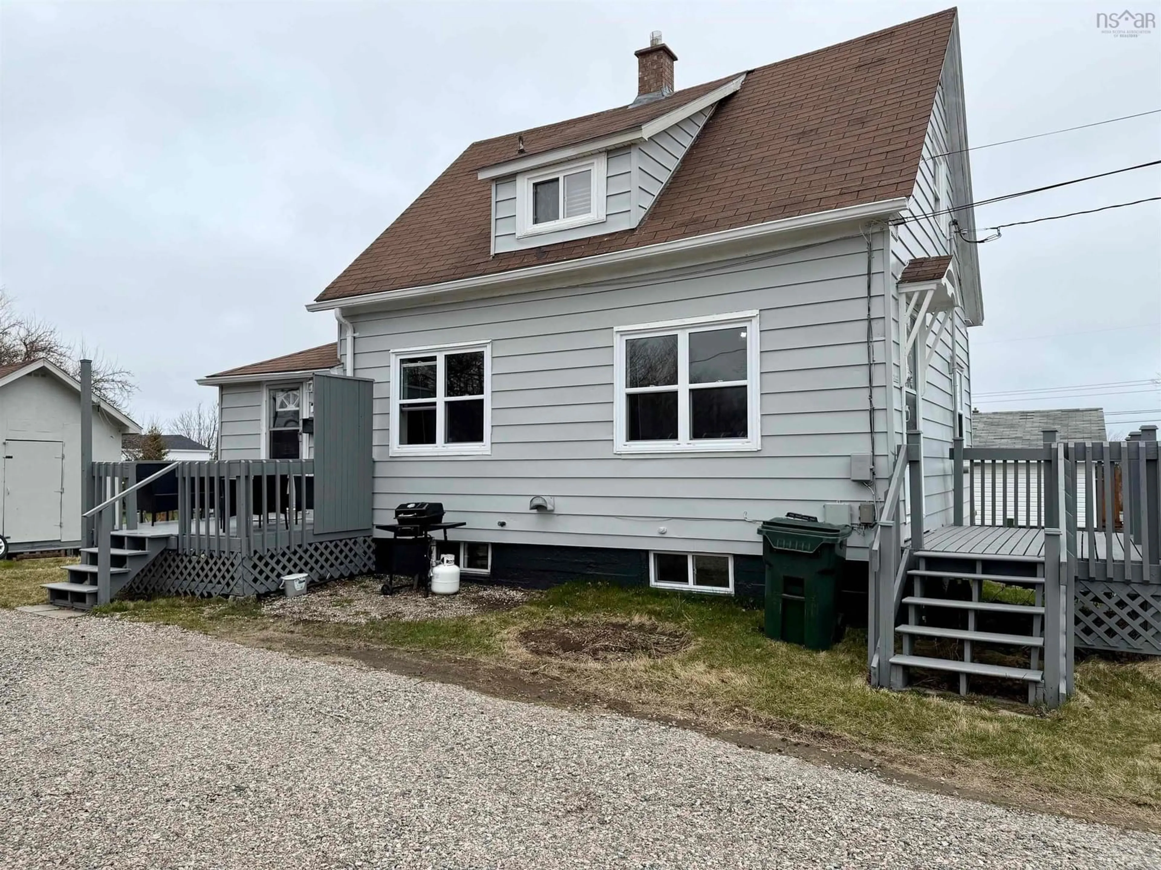 Home with vinyl exterior material, street for 51 Patrick St, Scotchtown Nova Scotia B1H 2X1