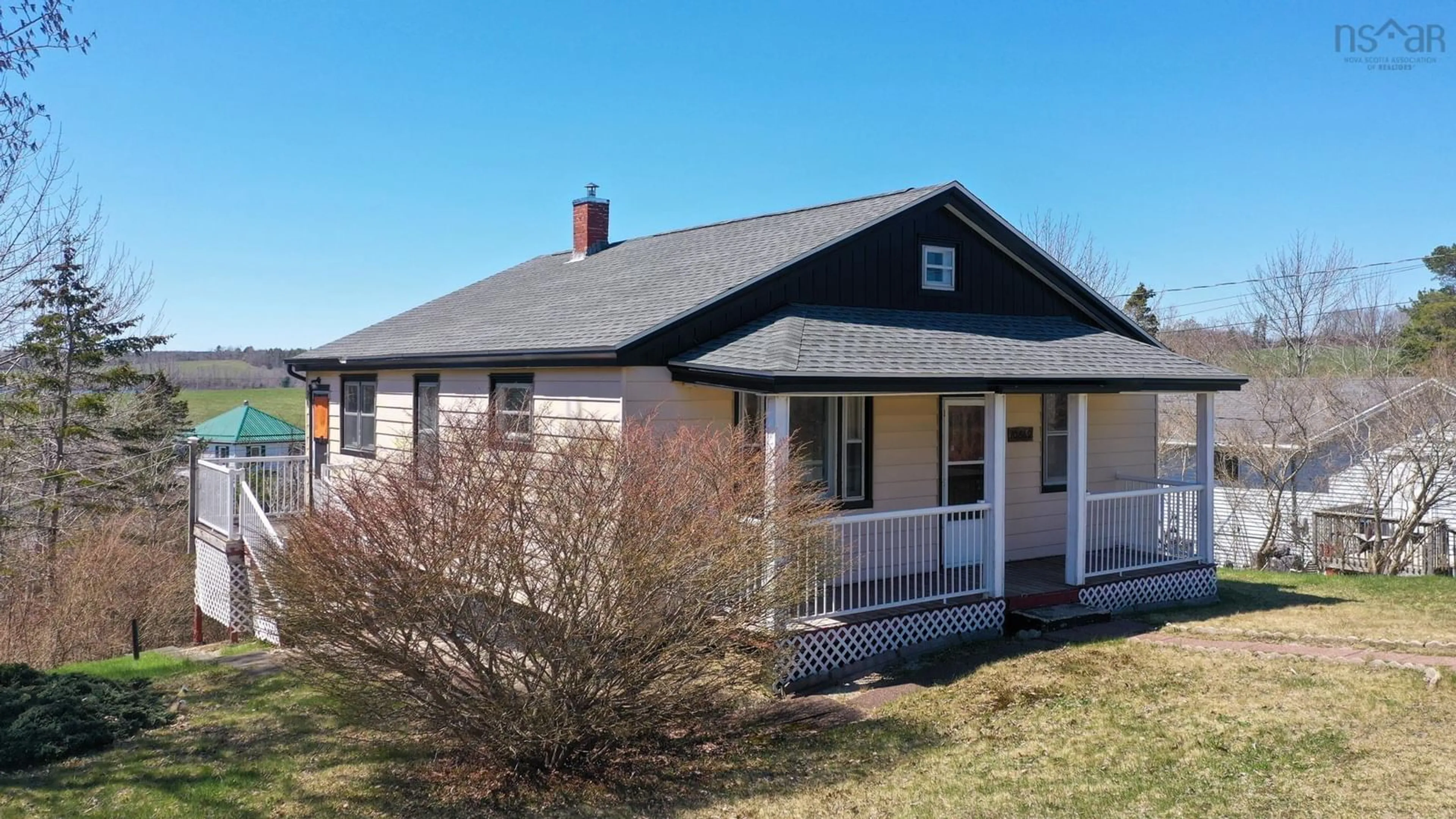 Home with vinyl exterior material, street for 10562 Highway 3, Deans Corner Nova Scotia B0J 2C0