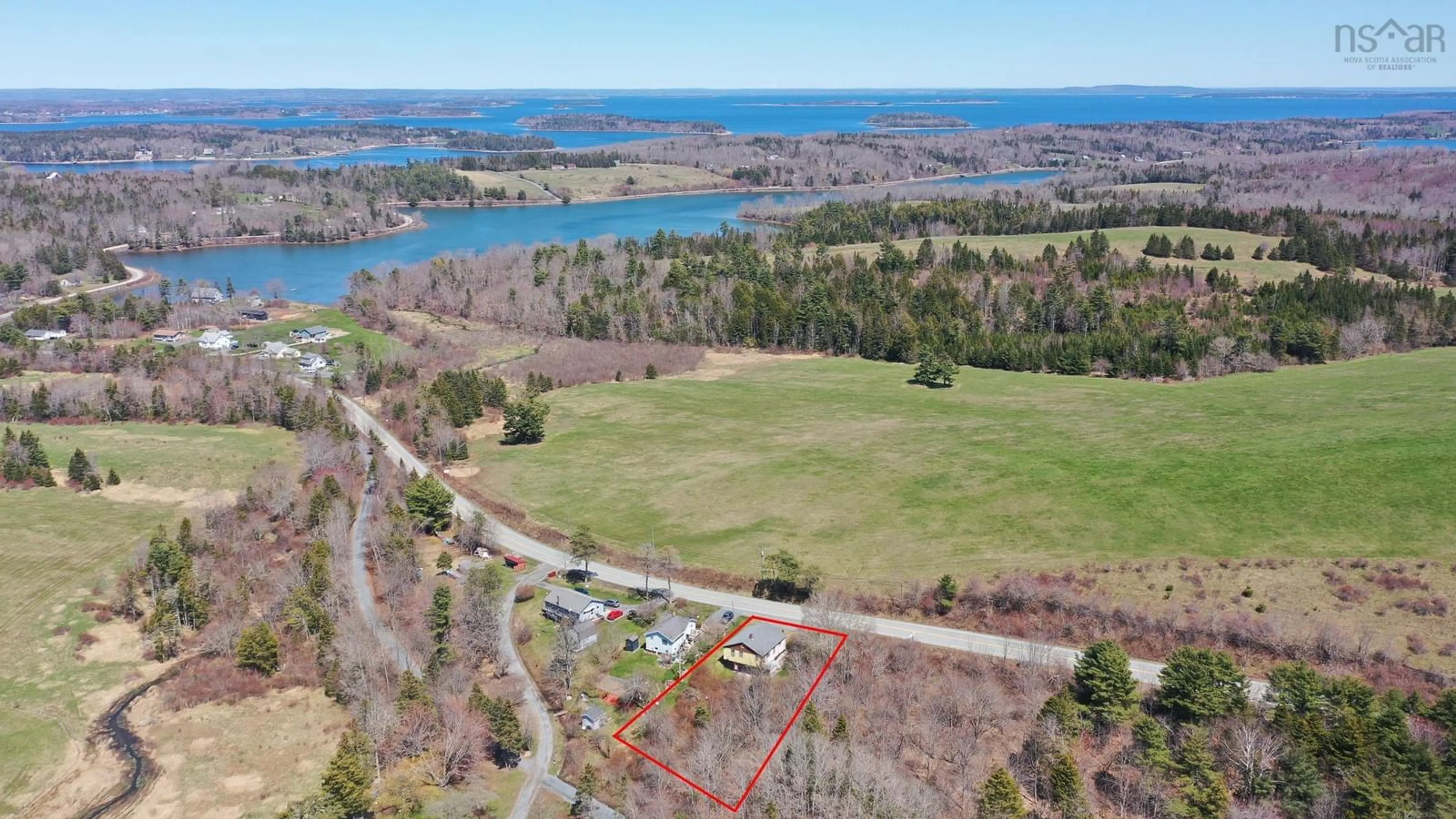 A pic from outside/outdoor area/front of a property/back of a property/a pic from drone, water/lake/river/ocean view for 10562 Highway 3, Deans Corner Nova Scotia B0J 2C0
