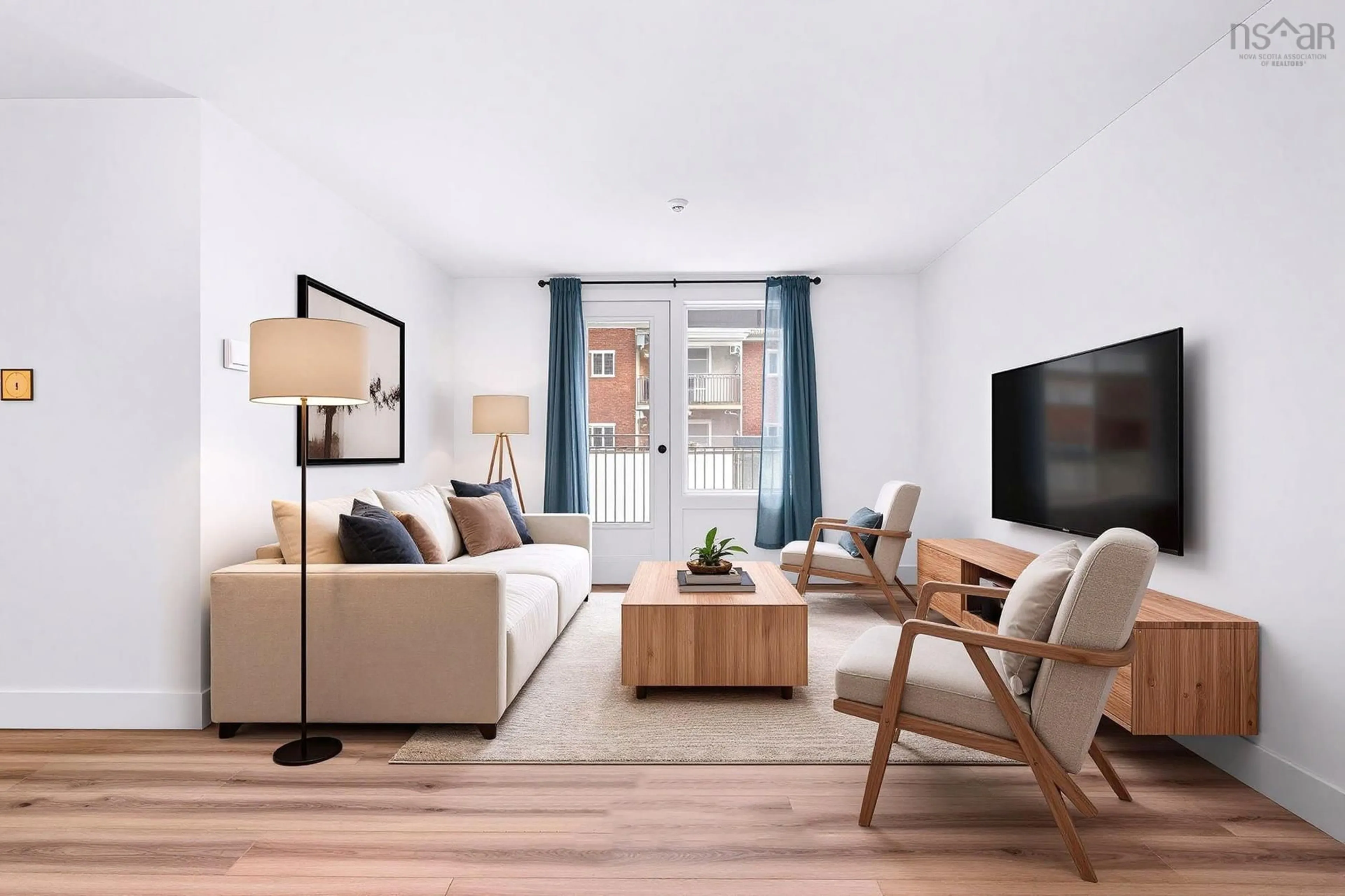 Living room with furniture, wood/laminate floor for 281 Windmill Rd #221, Dartmouth Nova Scotia B3A 4P9