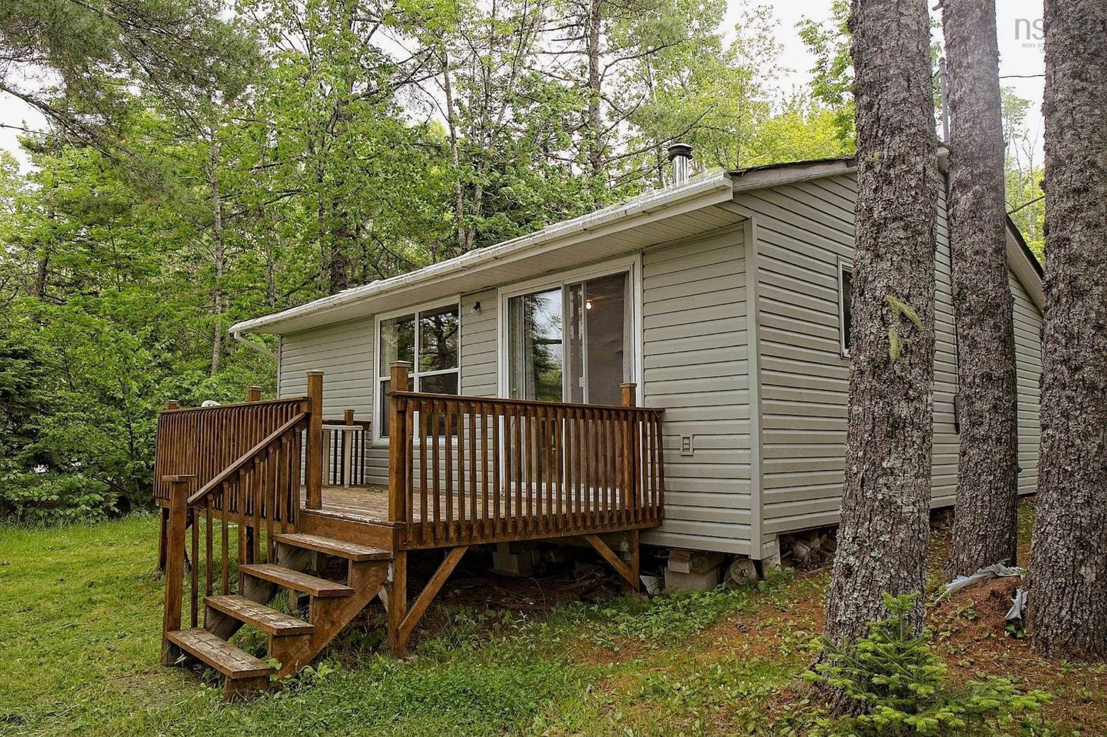 Home with vinyl exterior material, forest/trees view for 399 Leville Rd, New Ross Nova Scotia B0J 2M0