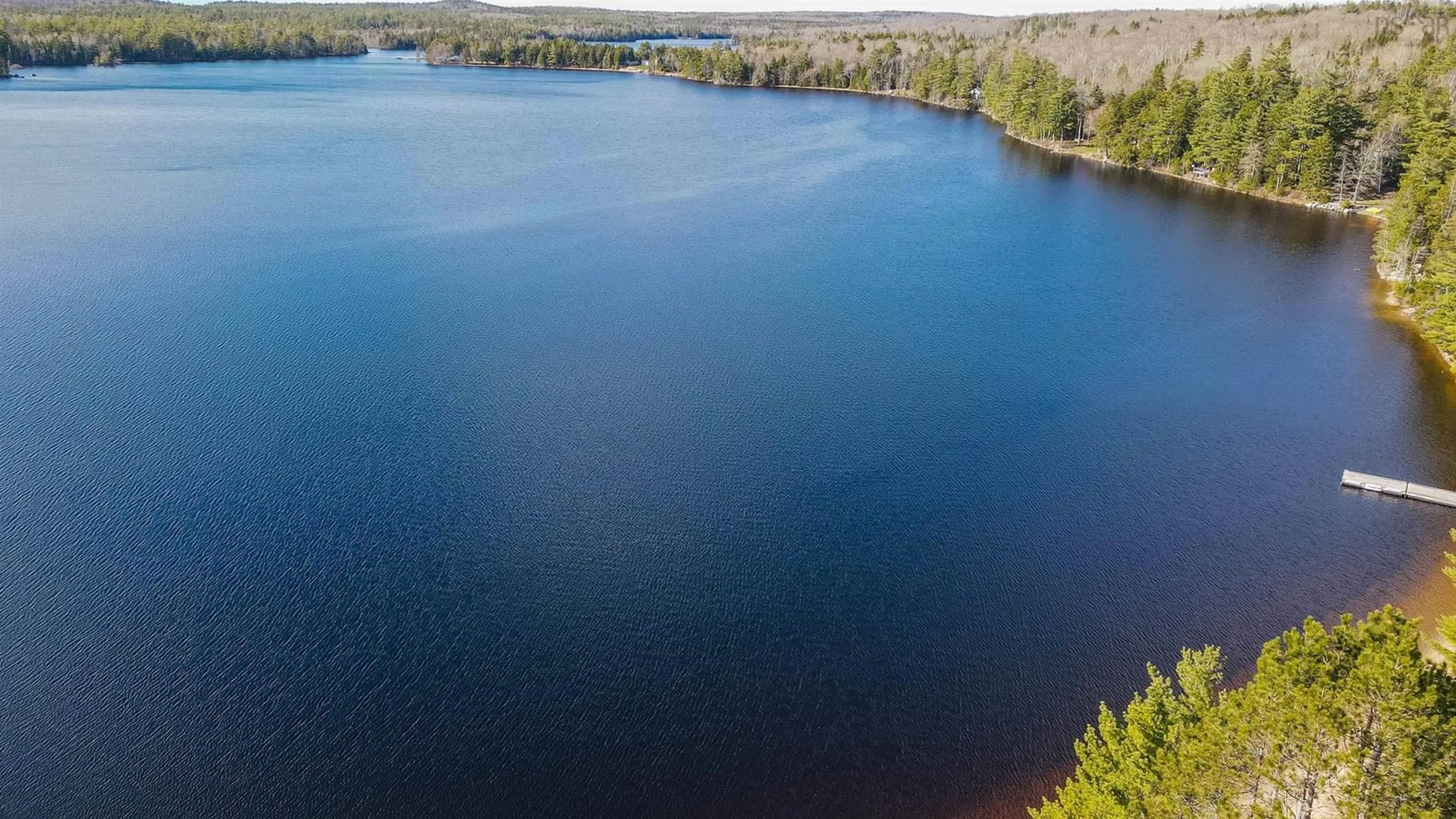 A pic from outside/outdoor area/front of a property/back of a property/a pic from drone, water/lake/river/ocean view for 64 Lake Paul Rd, Lake Paul Nova Scotia B0P 1C0