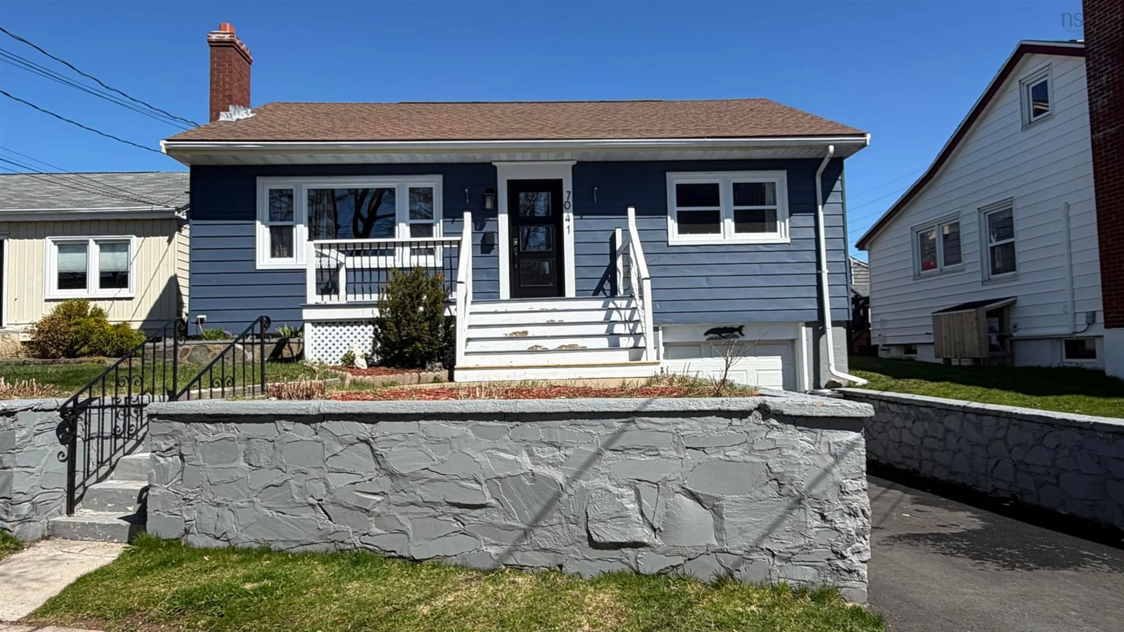 Home with vinyl exterior material, street for 7041 Pearson Dr, Halifax Nova Scotia B3L 2K7